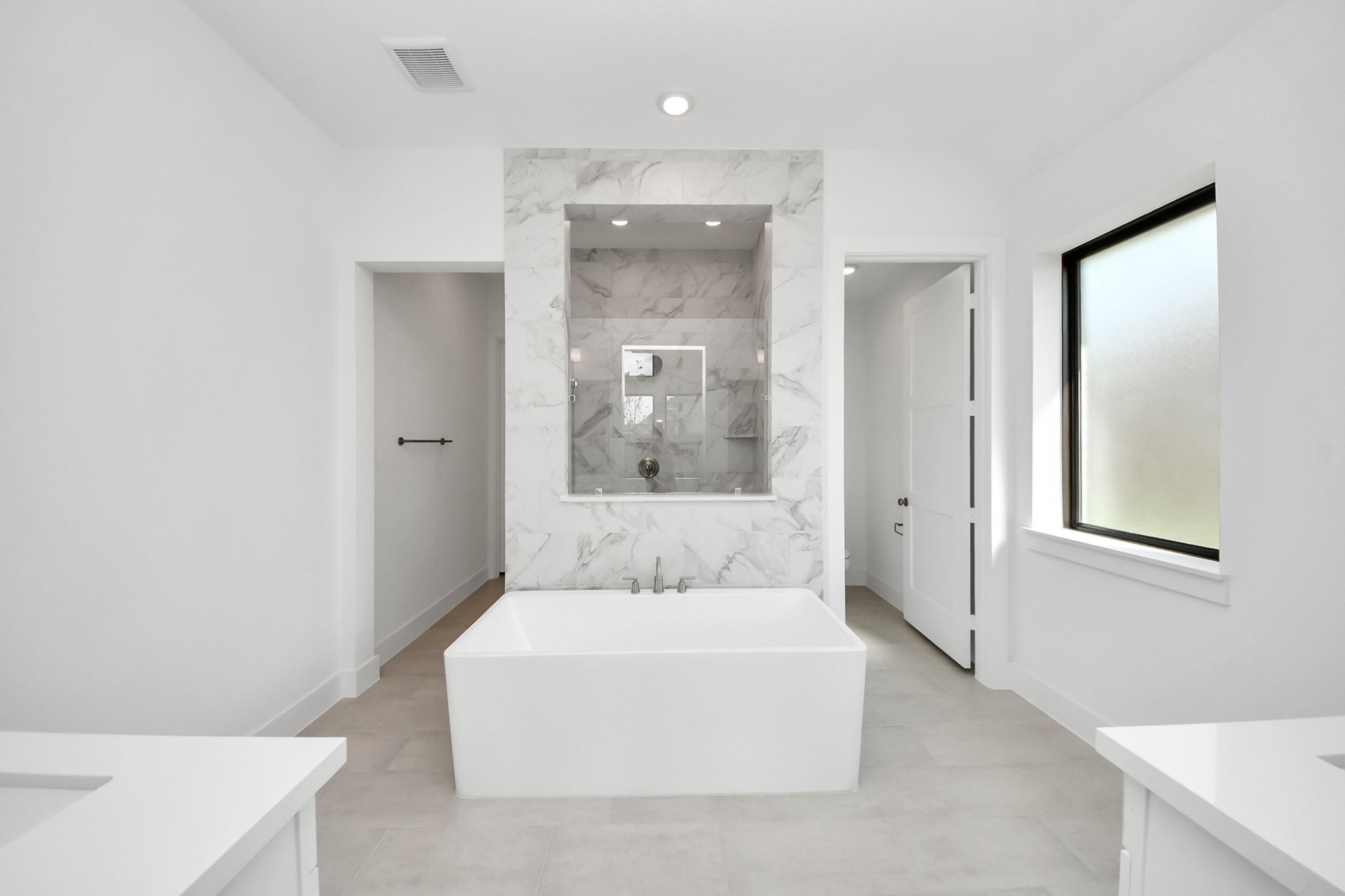 spacious bathroom with soaker tub and separate shower