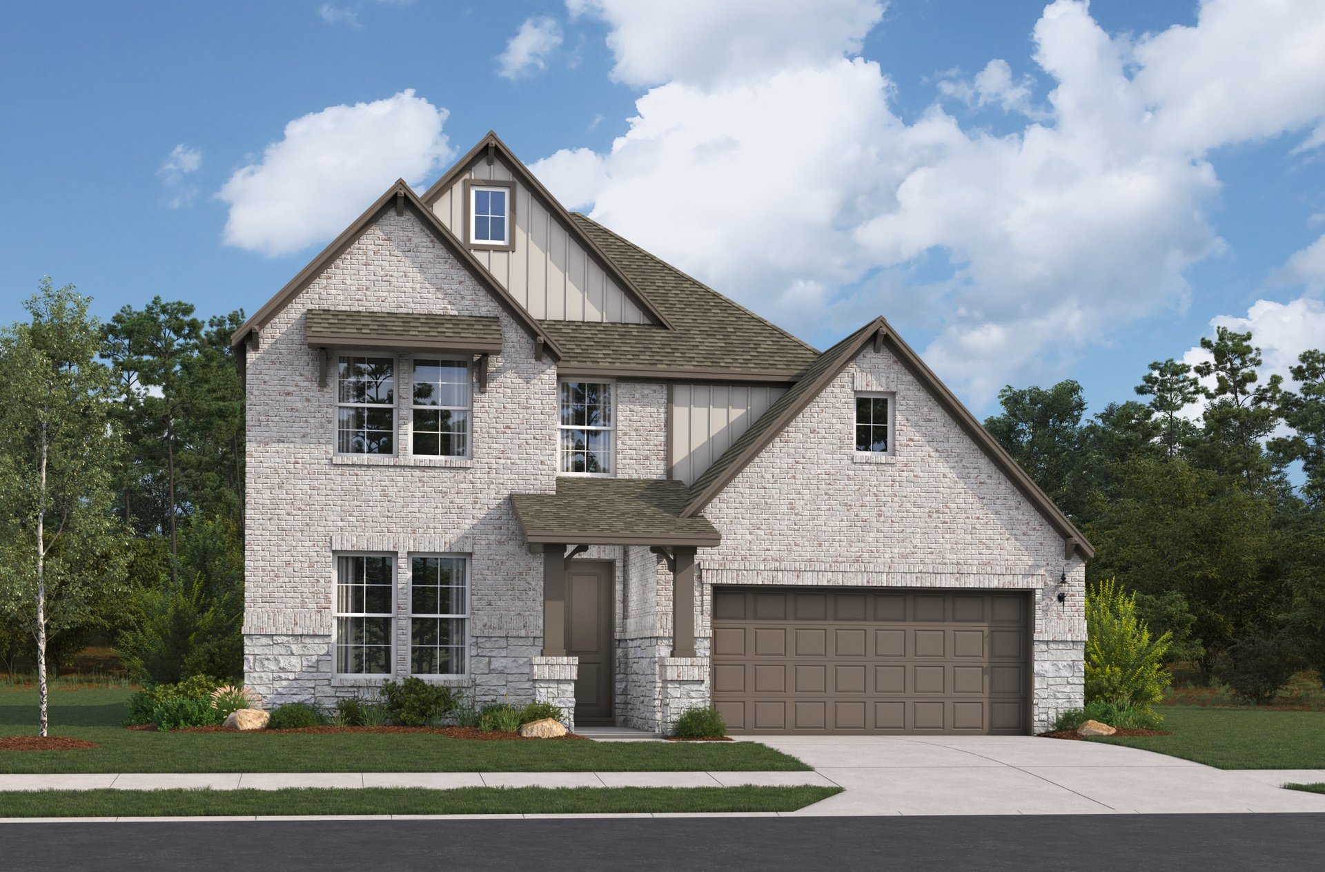 exterior with grass, trees & a 2-car garage