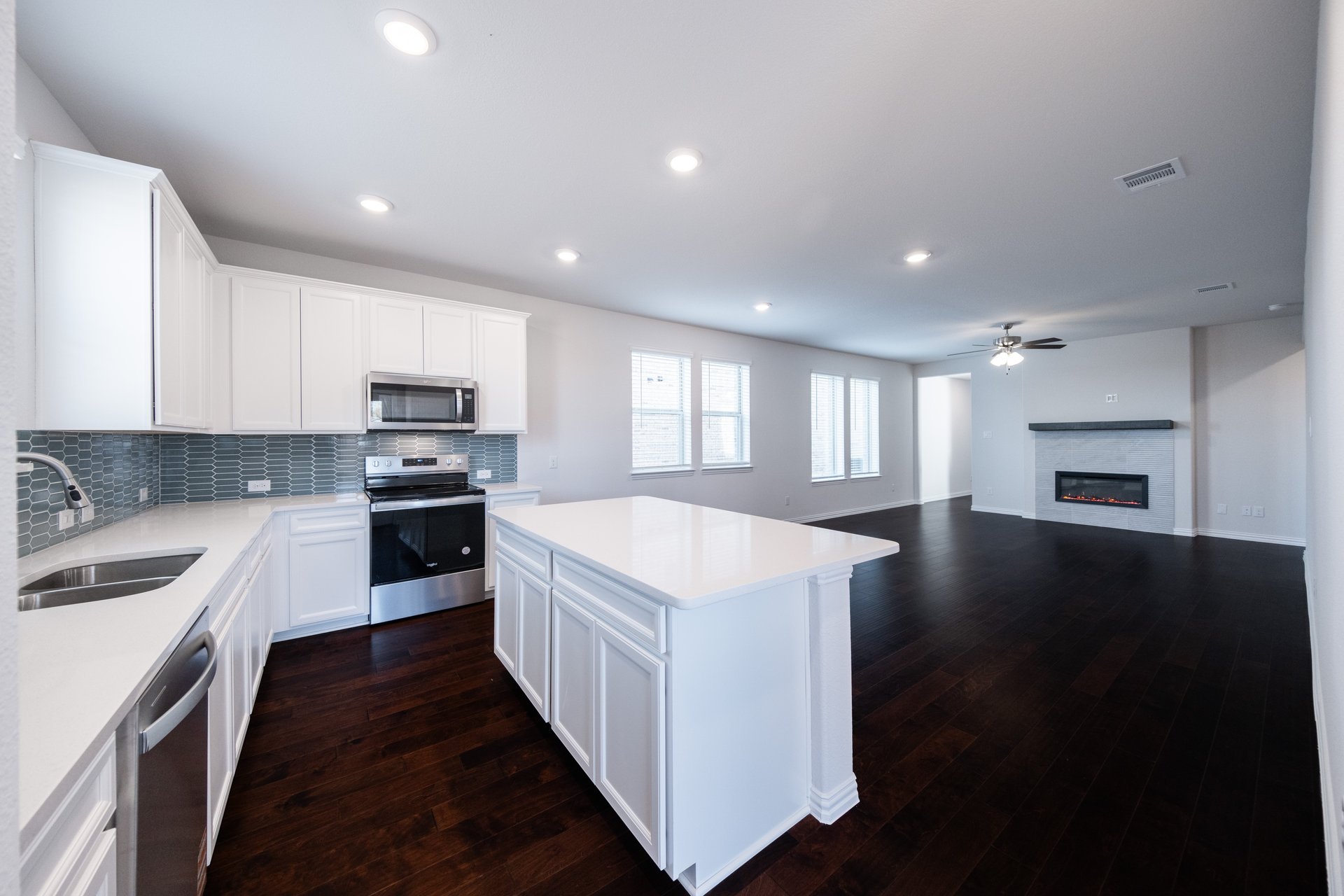 kitchen with large island and white countertops