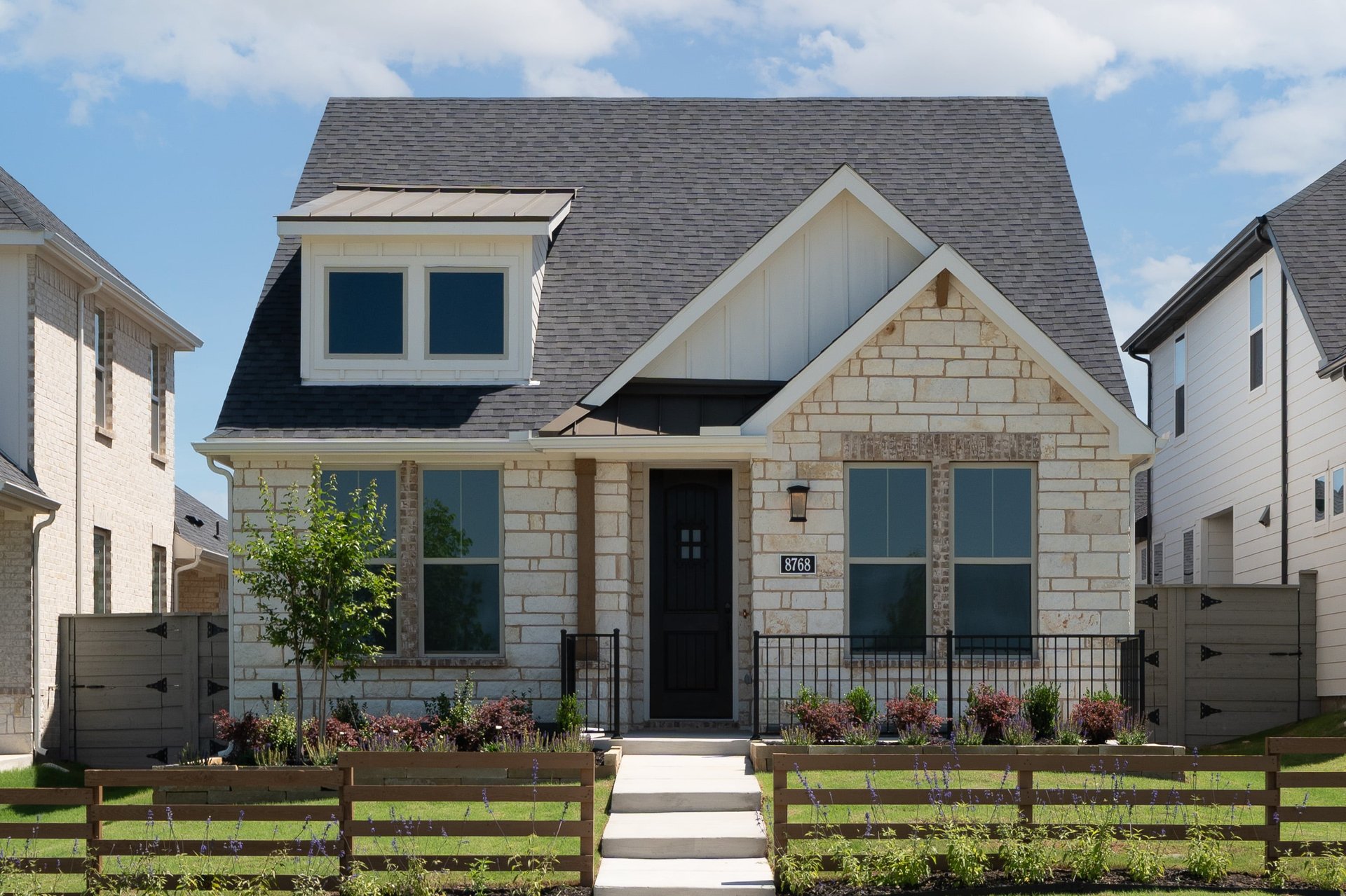 one-story with brick and stone exterior