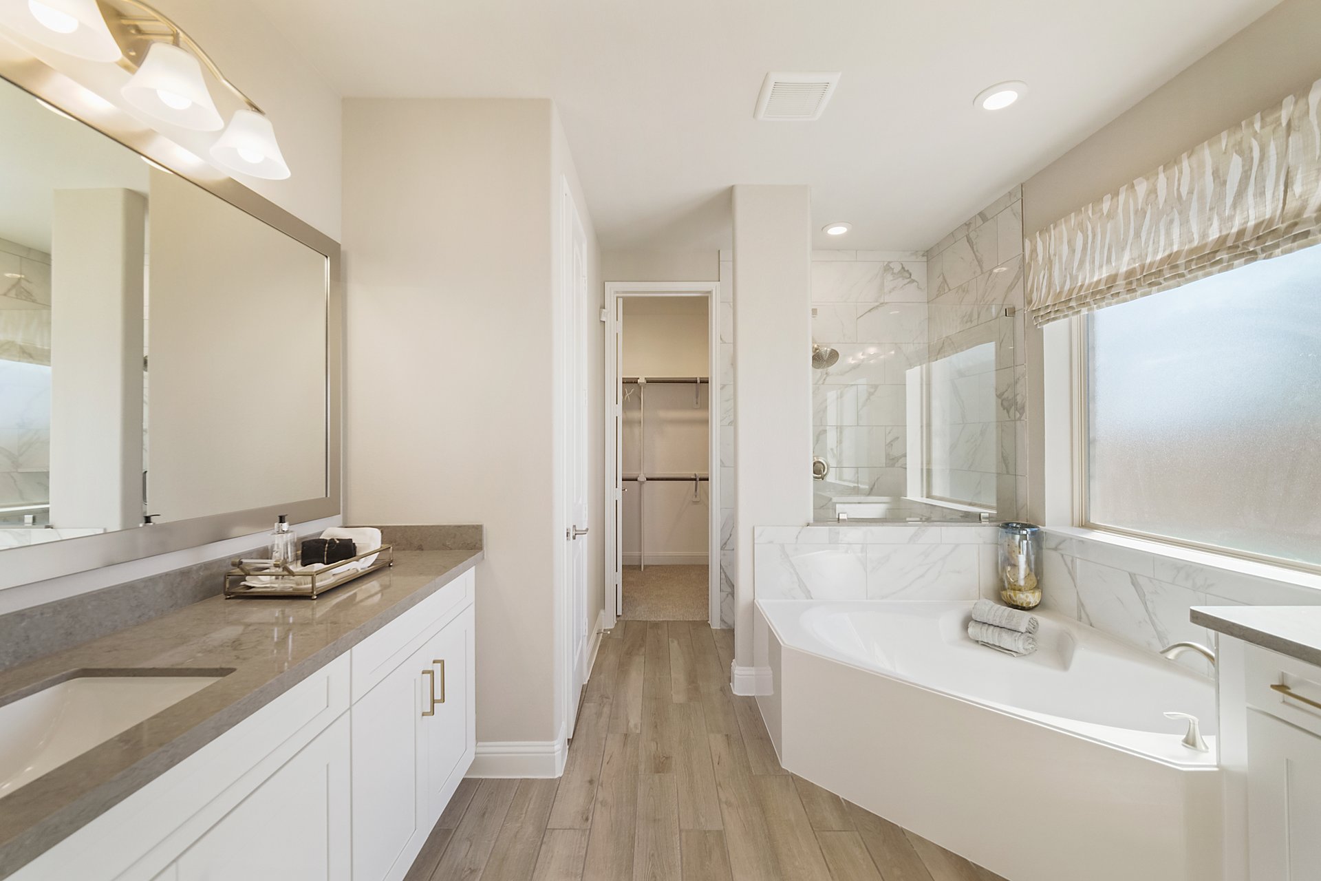 bathroom with white tub