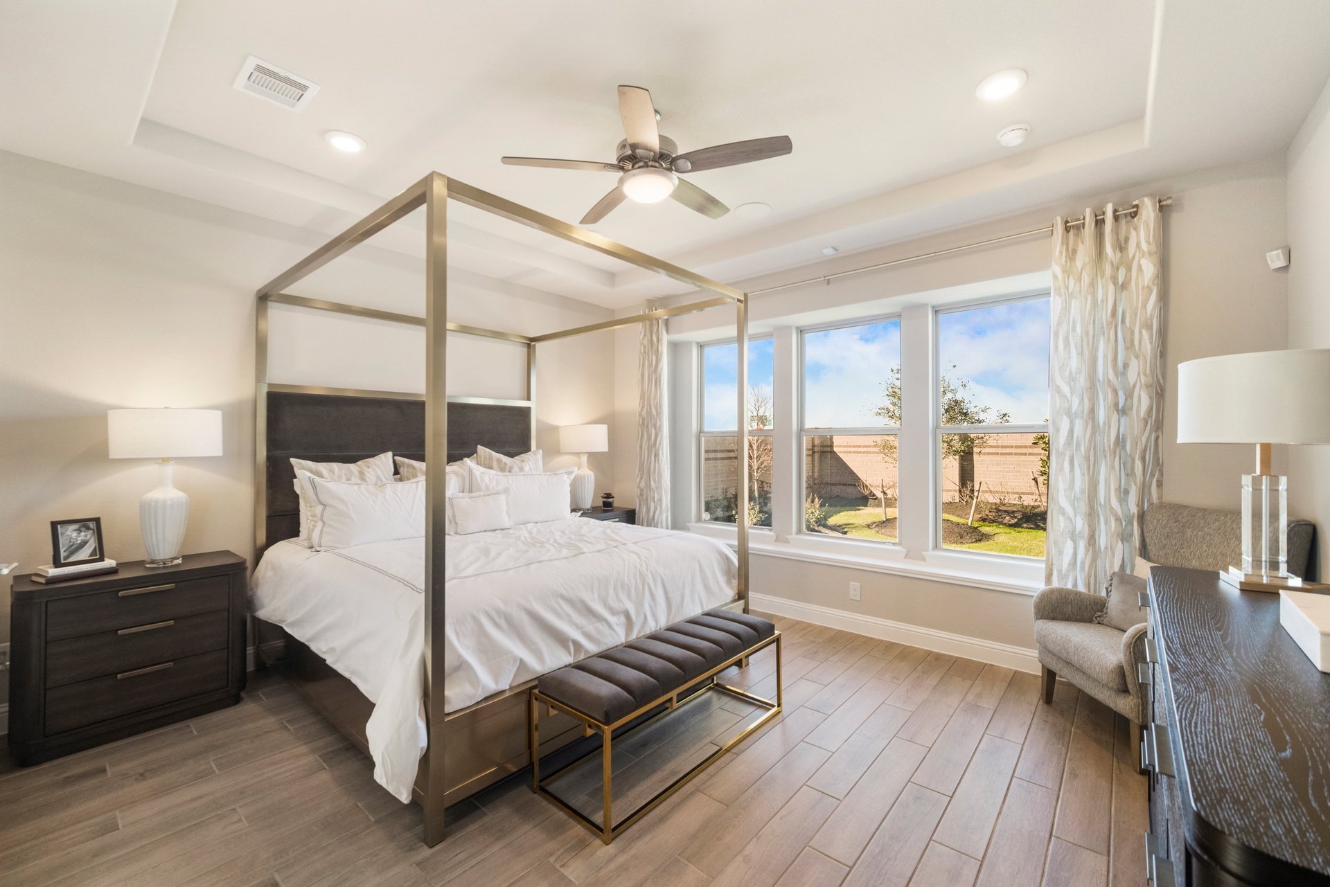 bedroom with gold bedframe