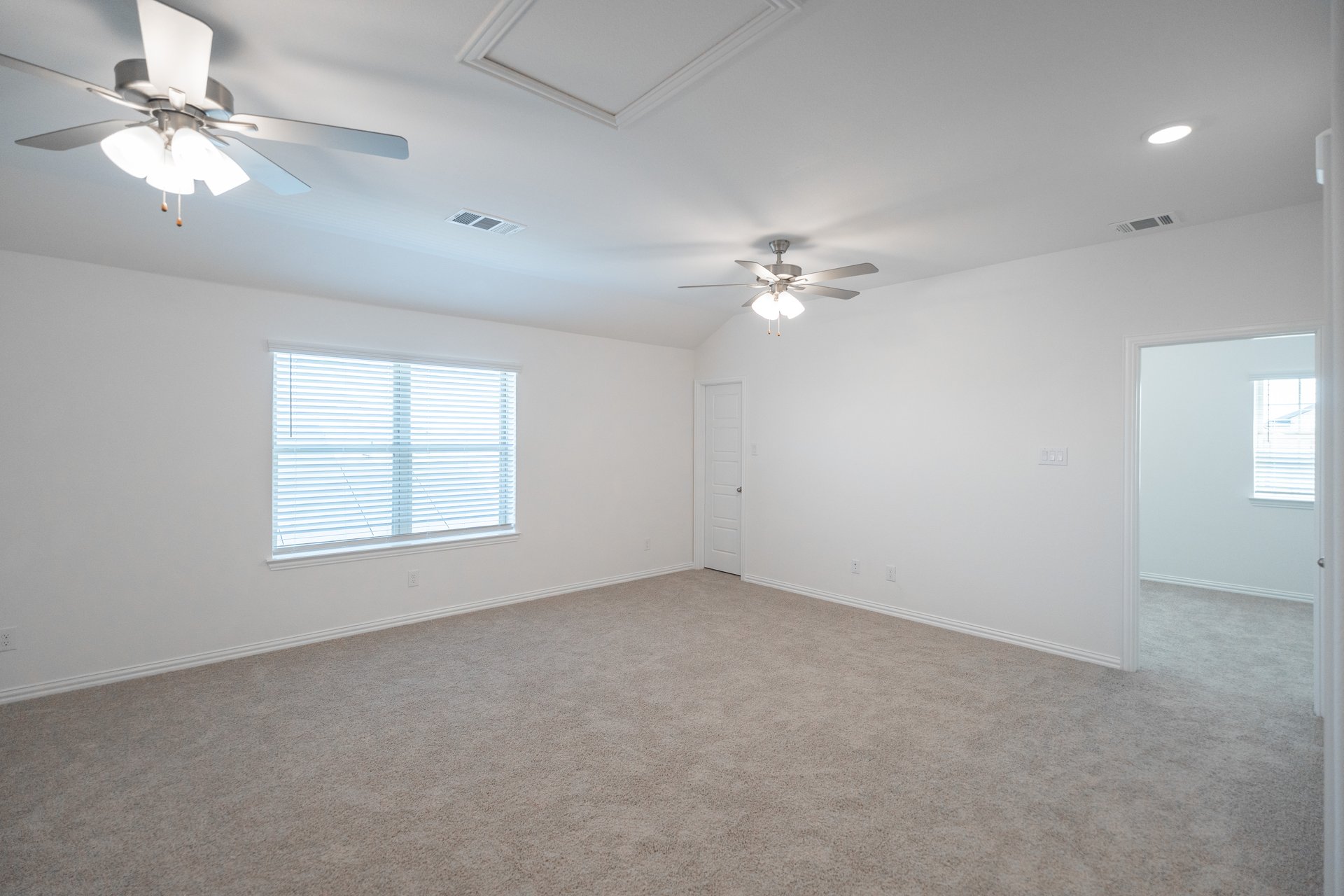 open gameroom with carpet and ceiling fan