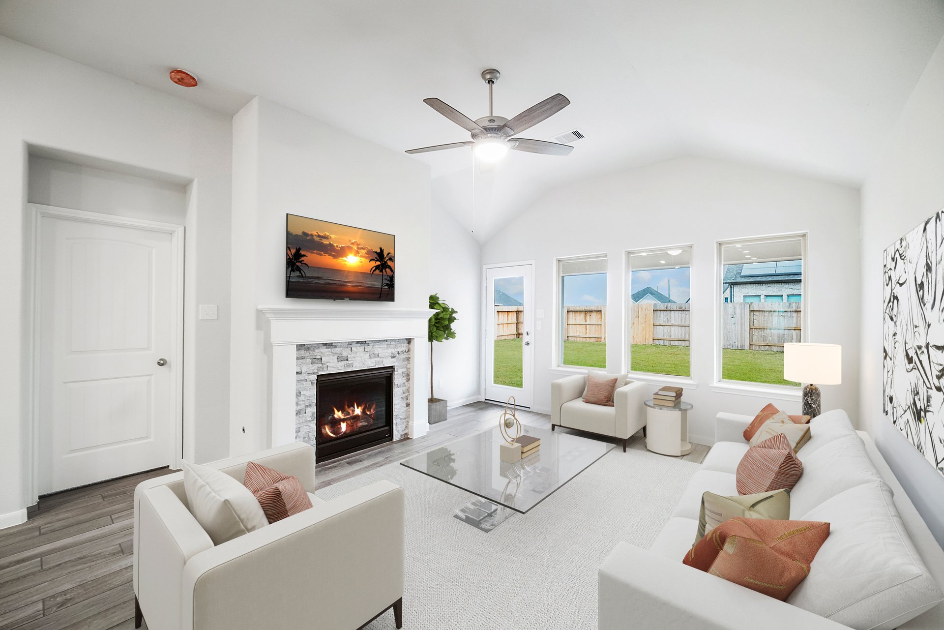 great room with ceiling fan