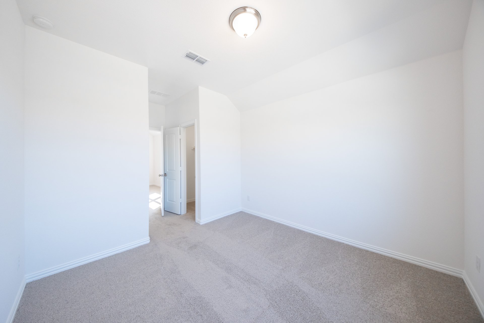 guest bedroom with carpet