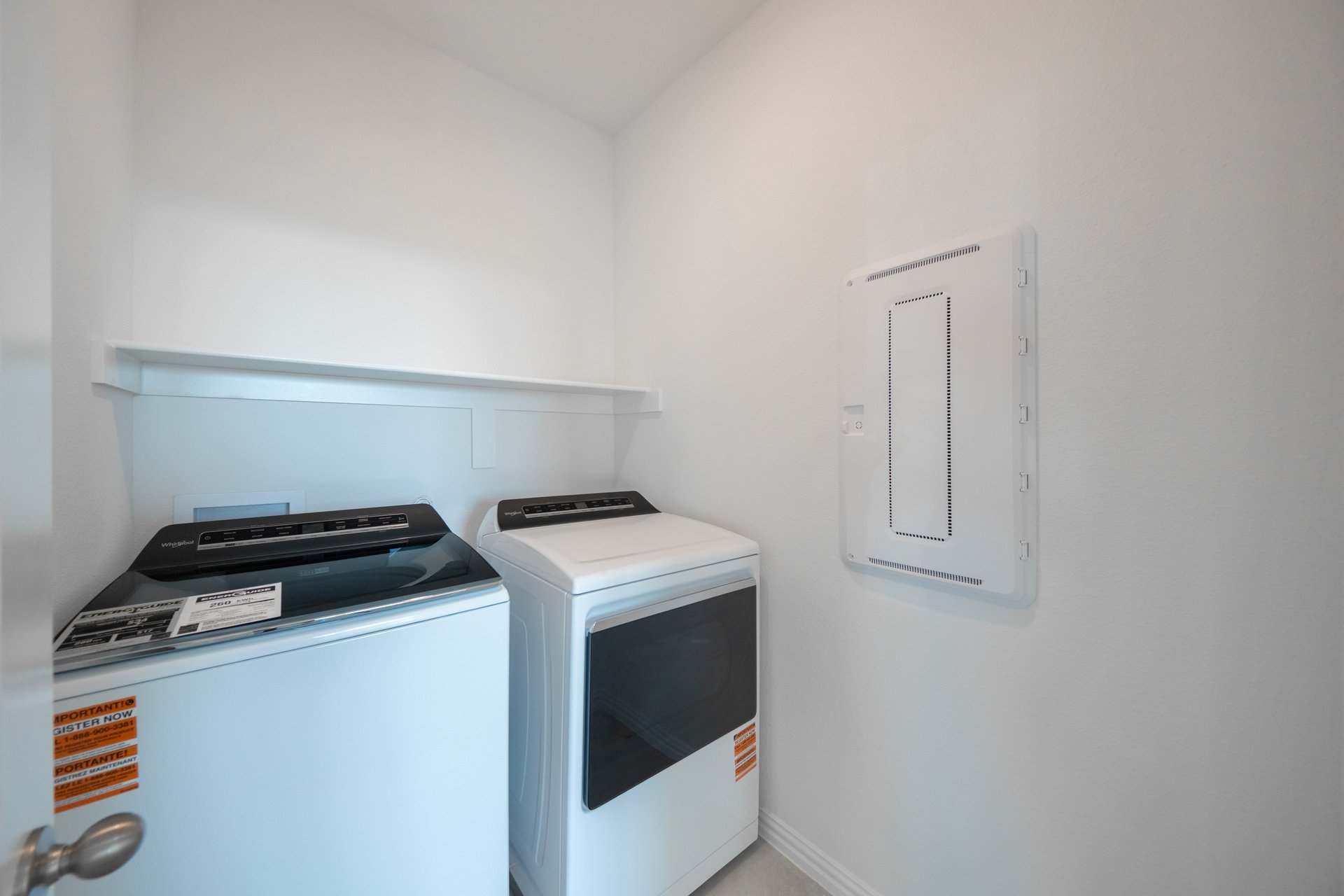 laundry room with included washer and dryer