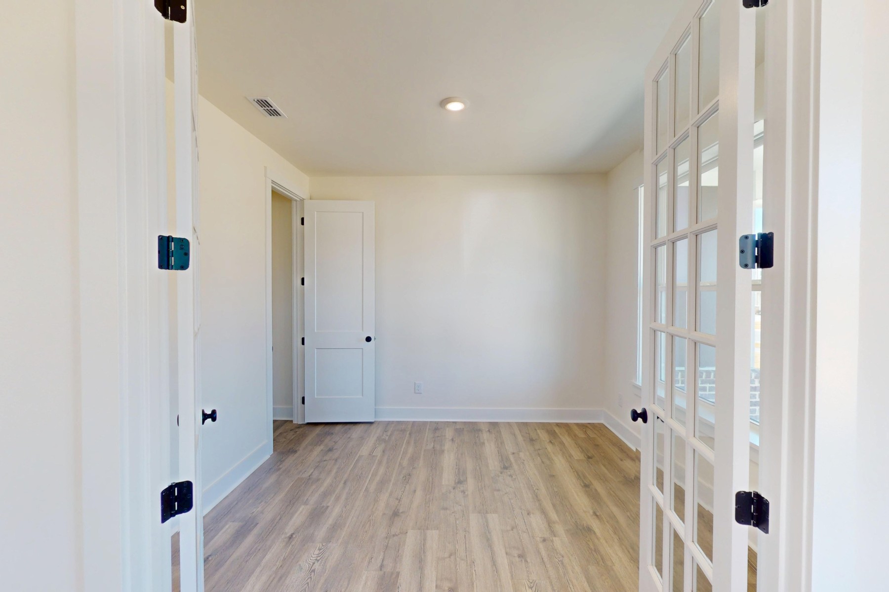 study with french doors and a window