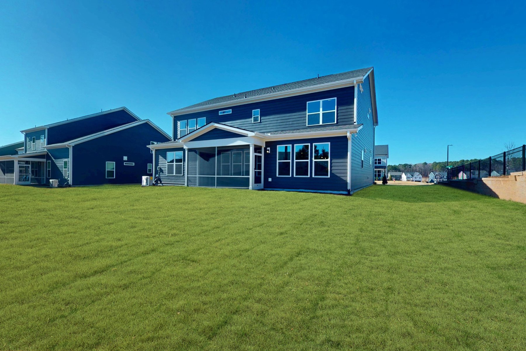 back yard with view of the screened-in porch