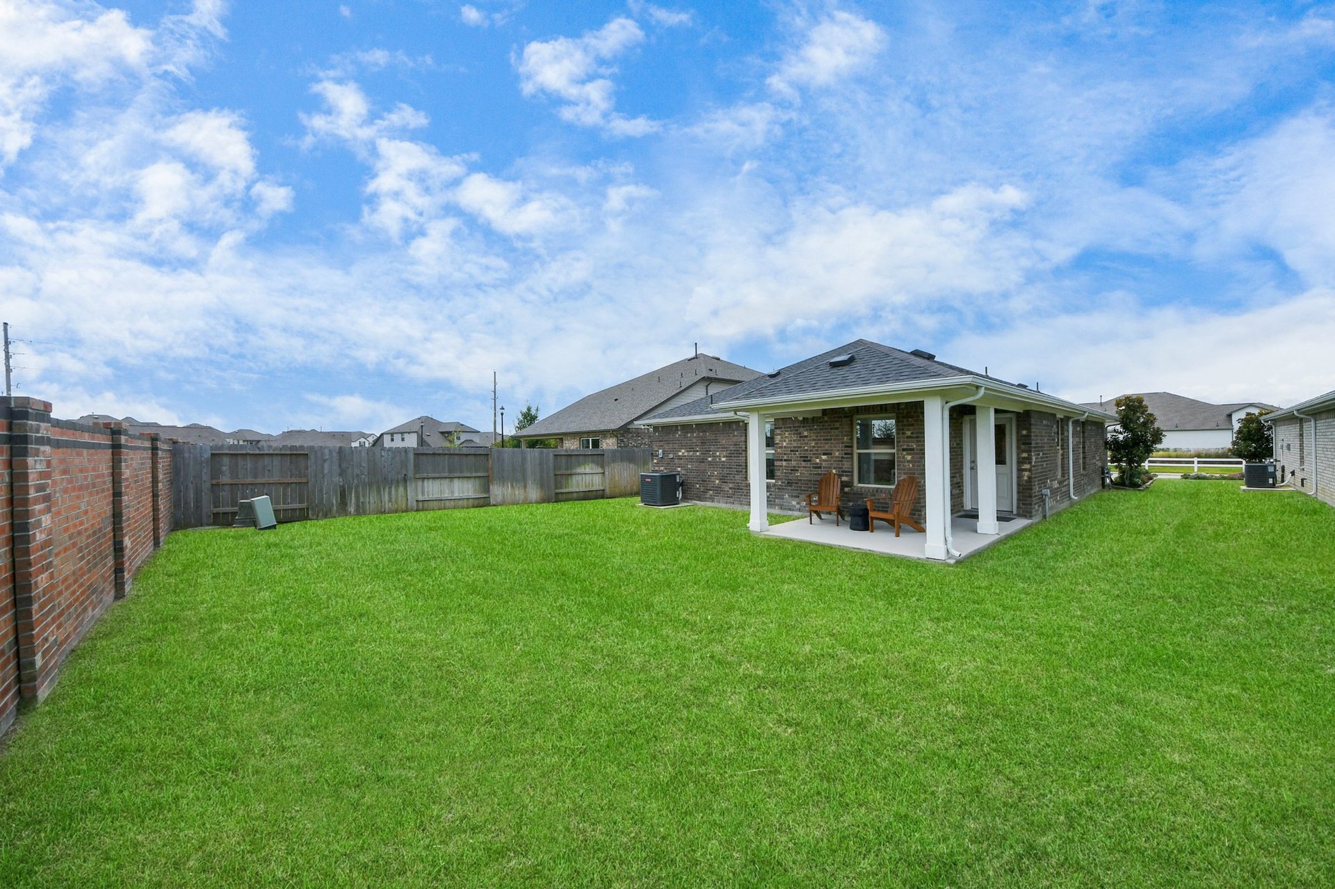 backyard of home with covered patio