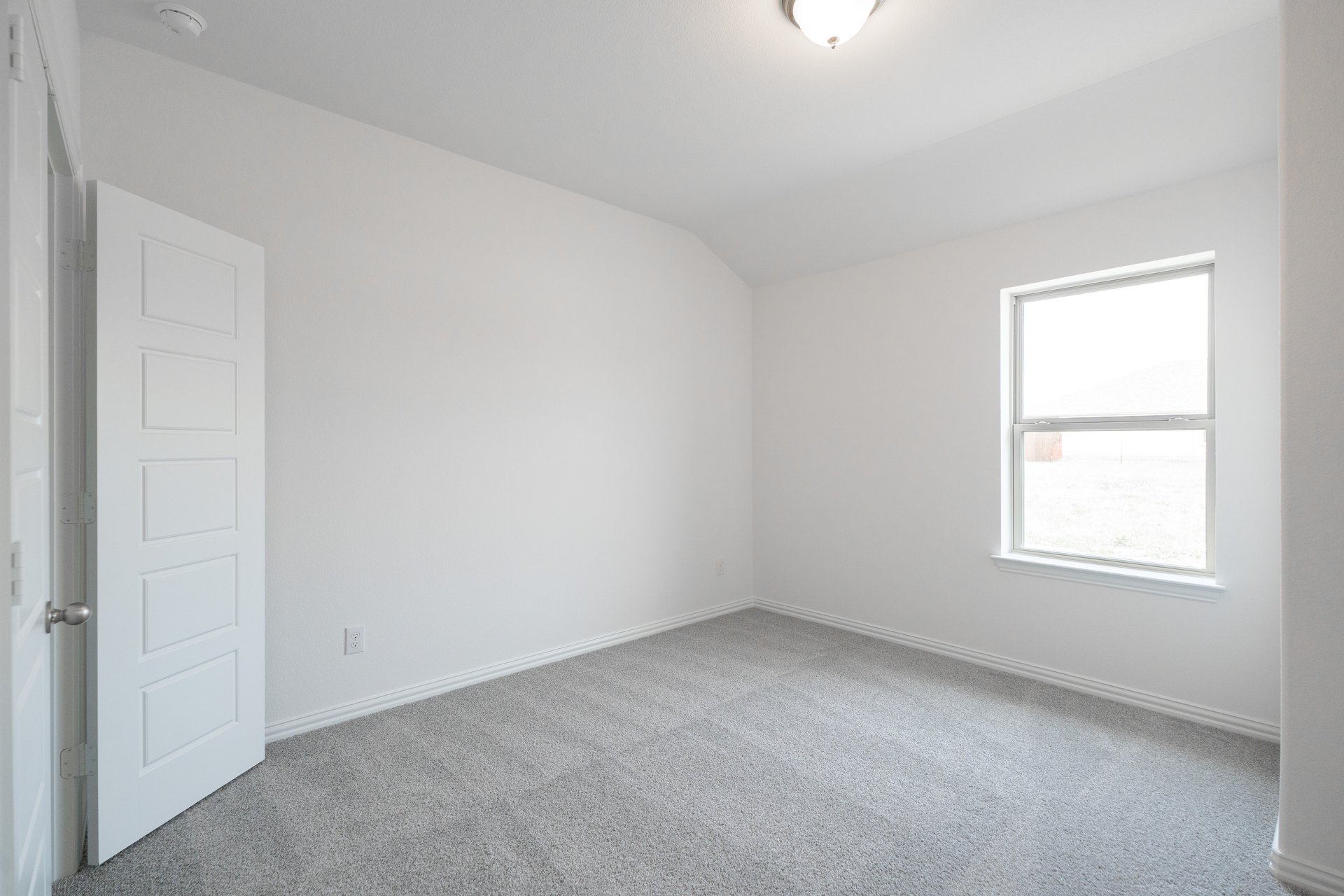 guest bedroom with carpet