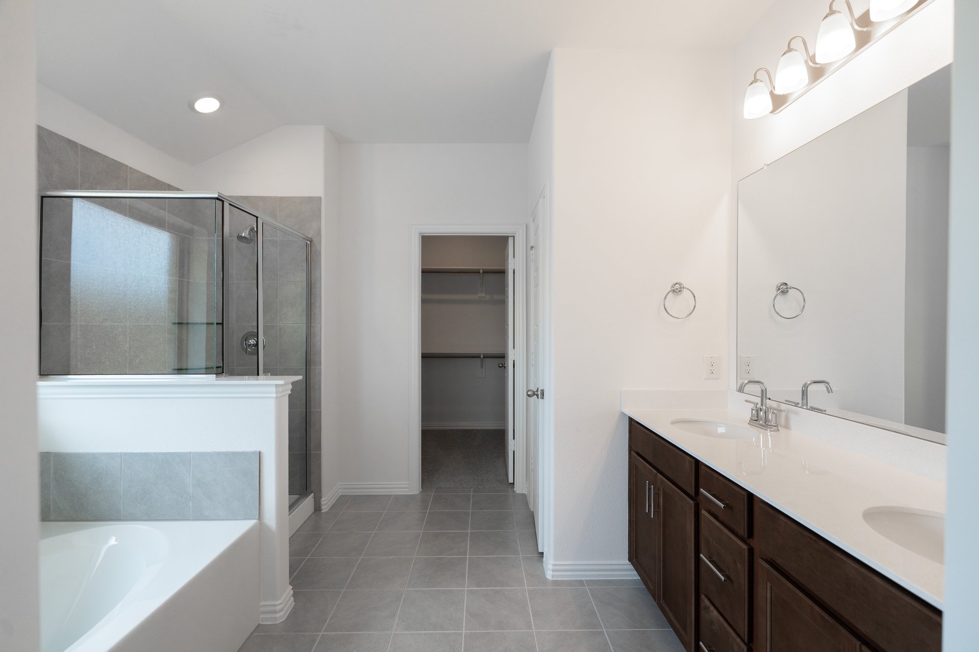 primary bathroom with soaking tub and shower