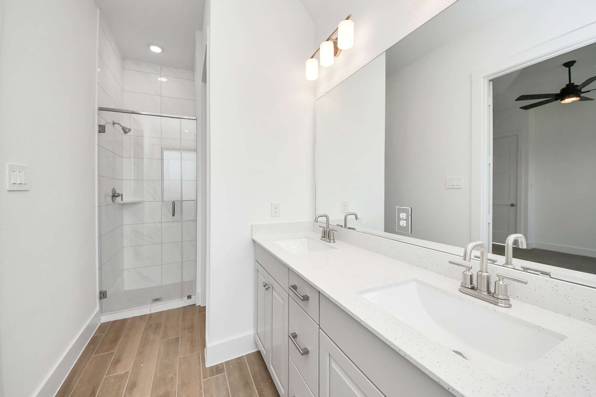 two sinks and separate shower