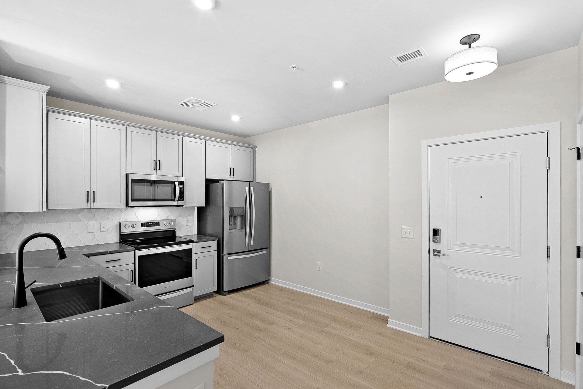 kitchen with quartz countertops and stainless steel appliances