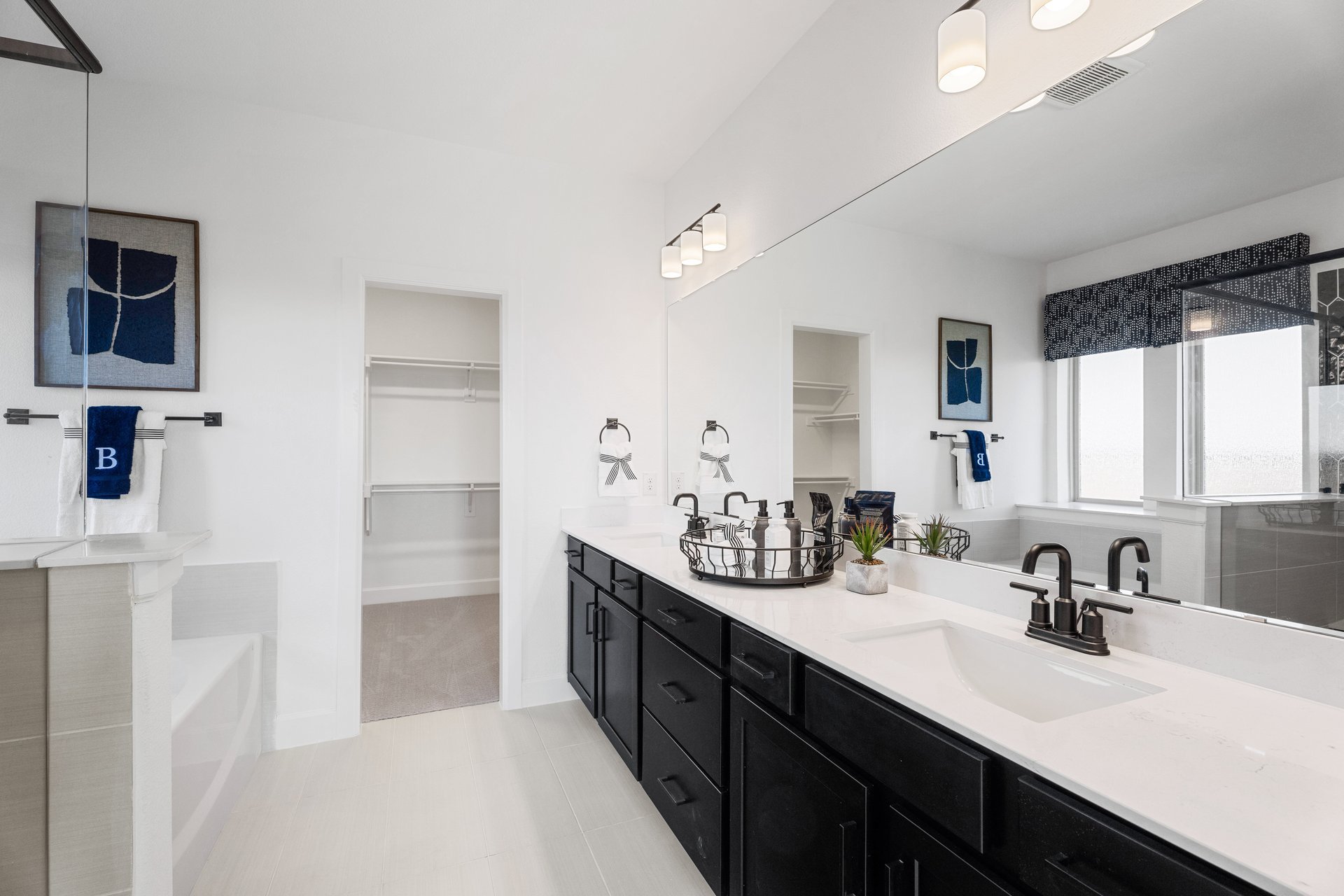bathroom with two sinks and white countertops 