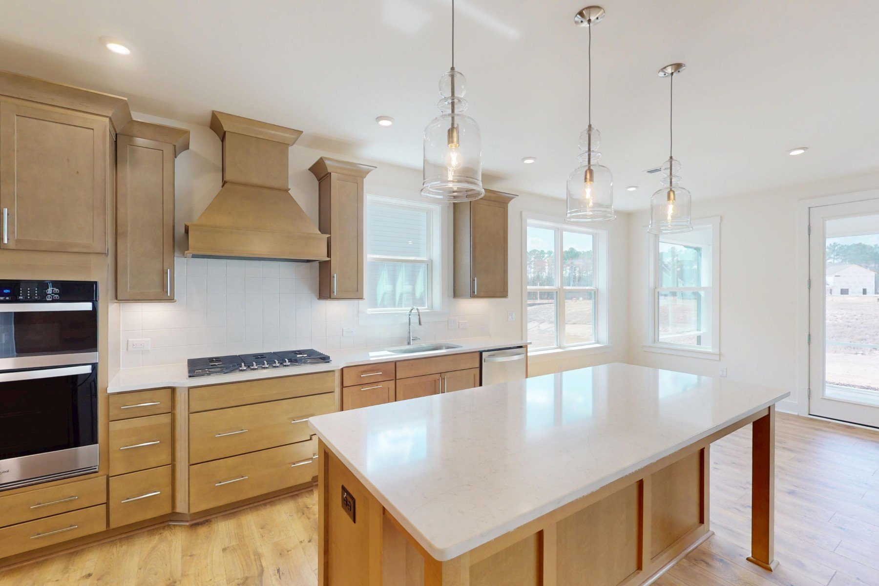 kitchen with an island and pendant lighting