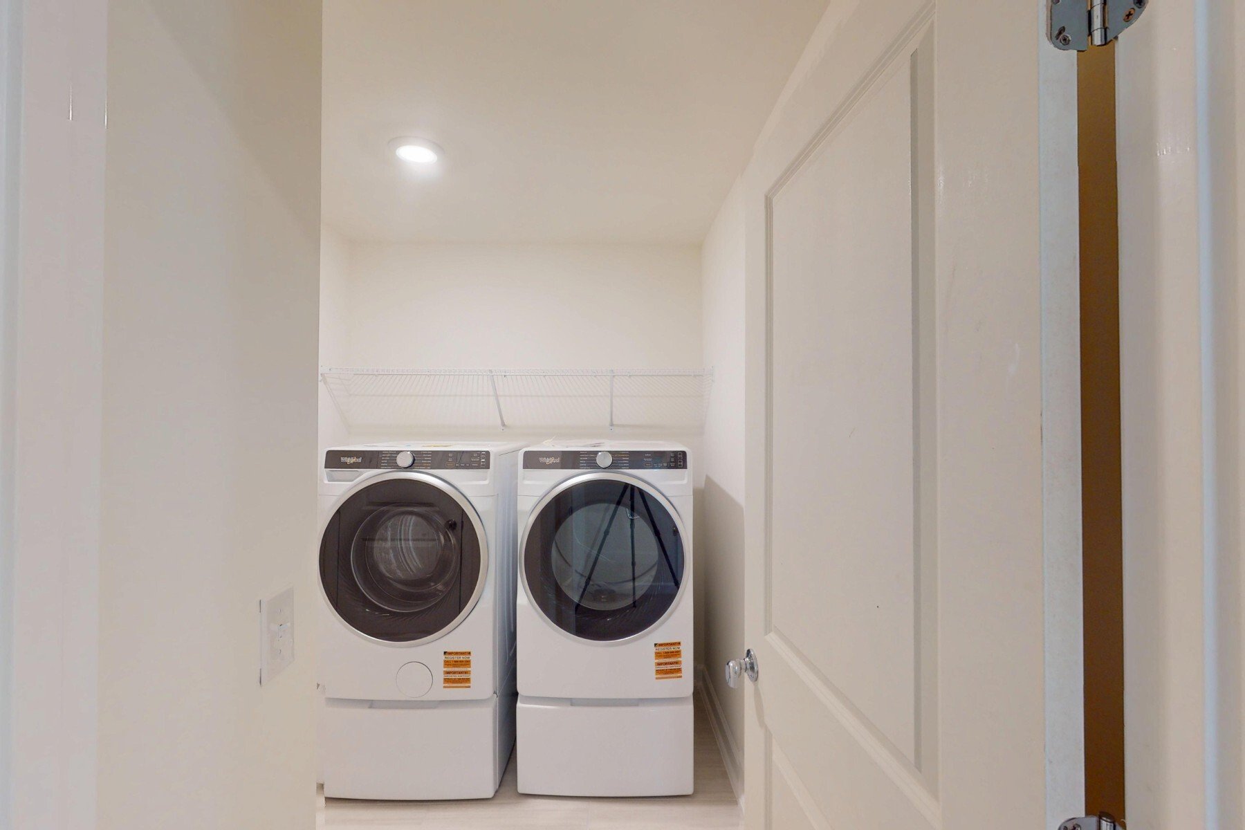 laundry room with washer and dryer