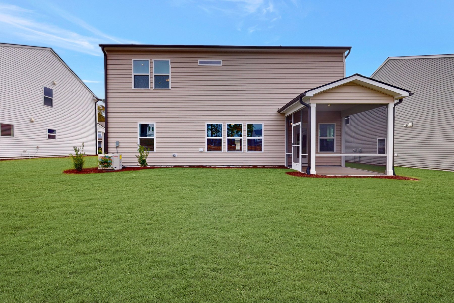 screened porch and backyard