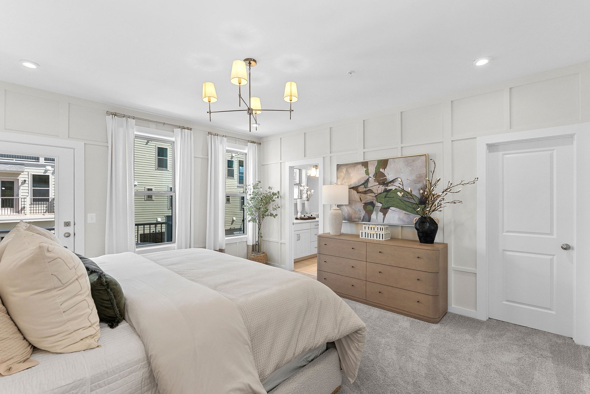 primary bedroom with two windows