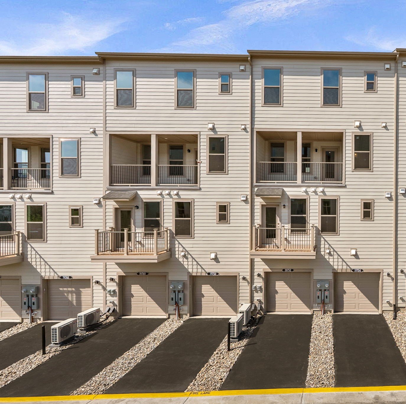 rear exterior with a one-car garage