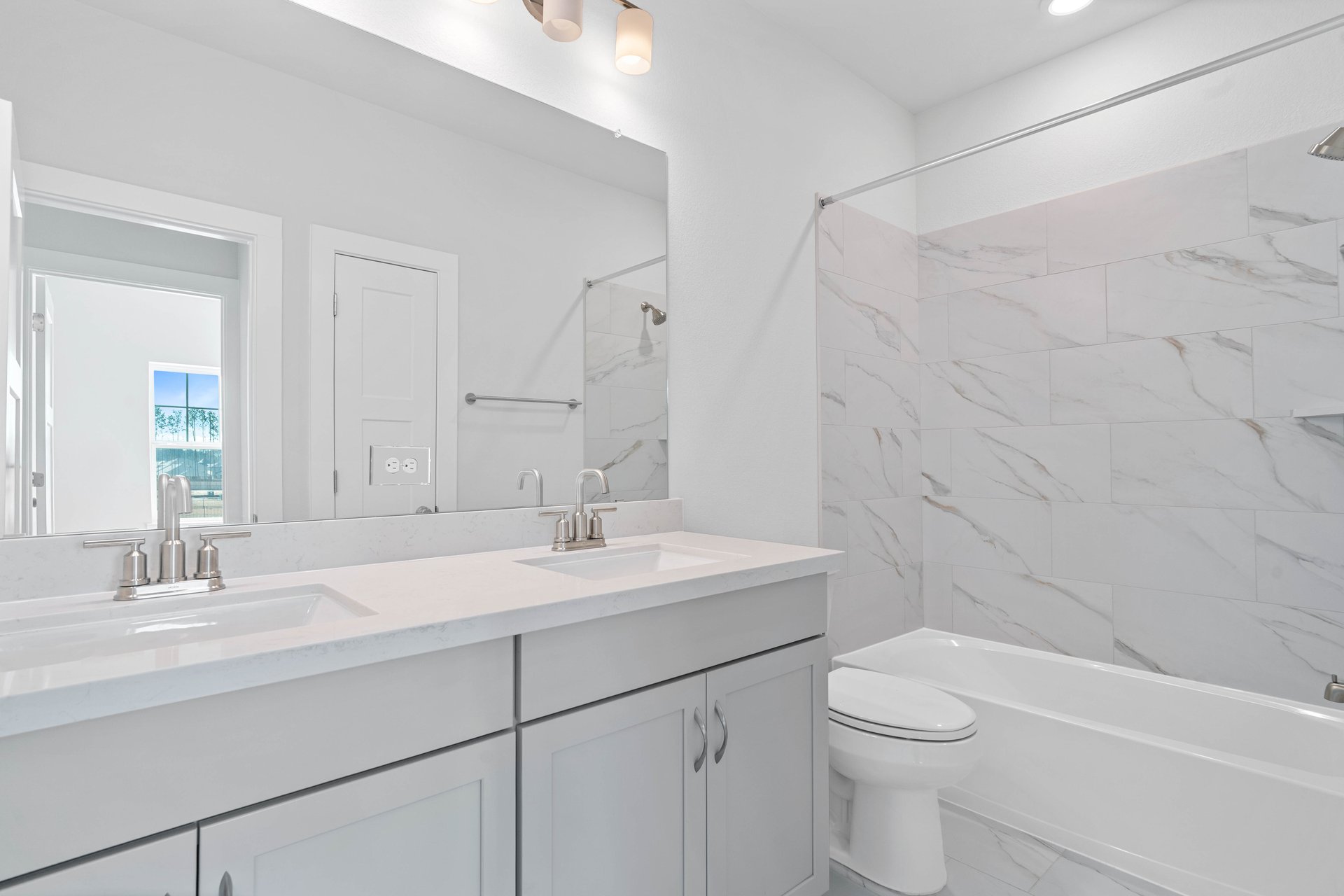 Enchante Secondary Bathroom.jpg