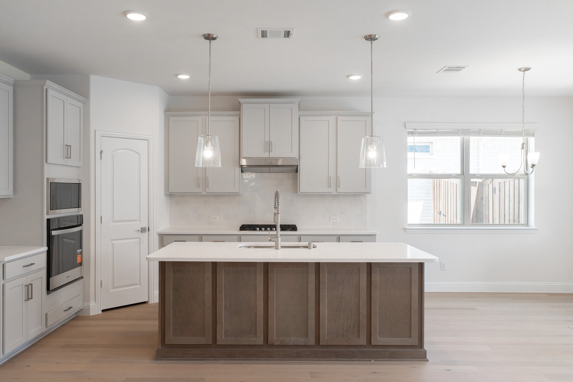 kitchen with large island and white countertops 