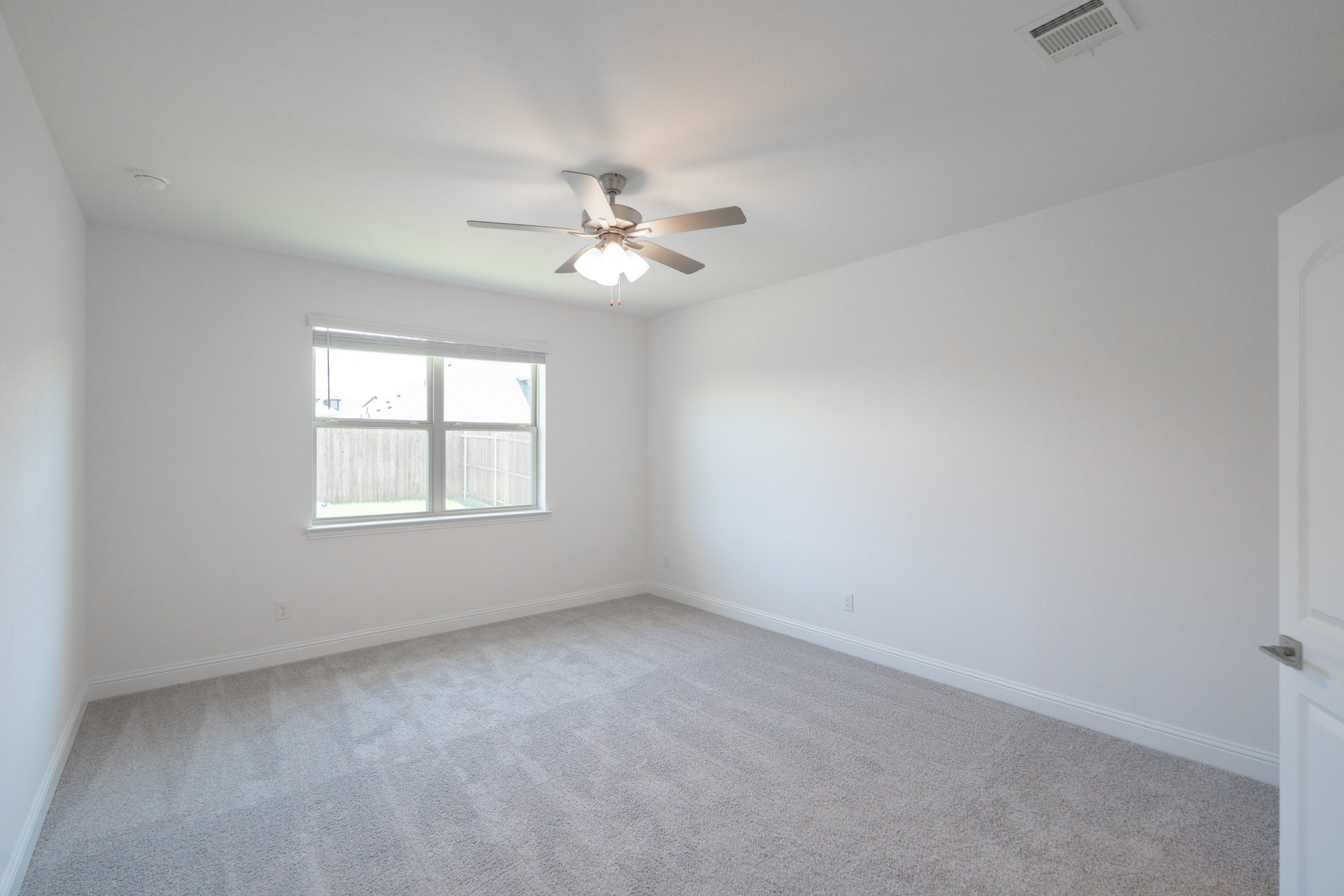 bedroom with carpet and ceiling fan 