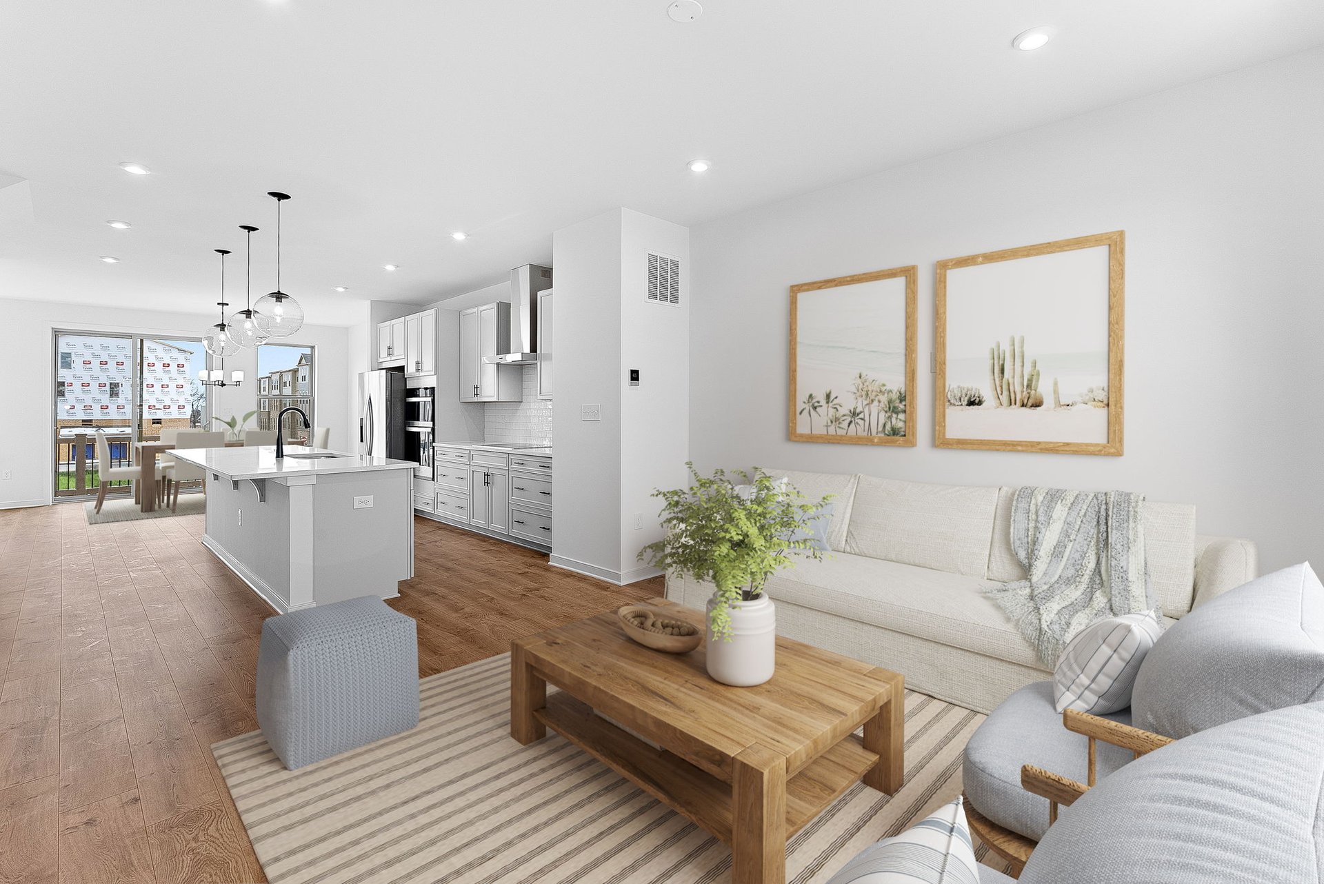 great room with a view of the kitchen and dining area