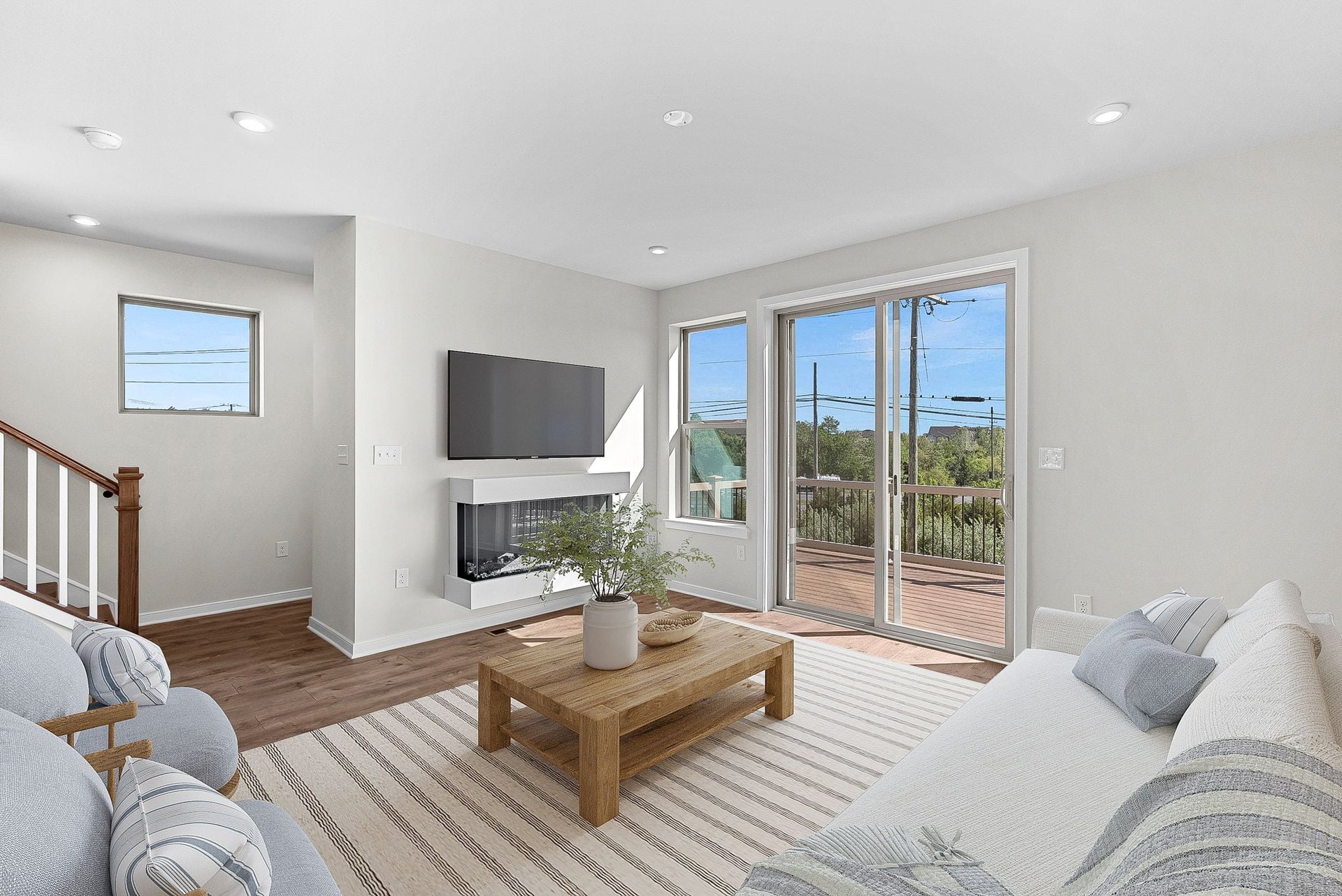 great room with access to the deck