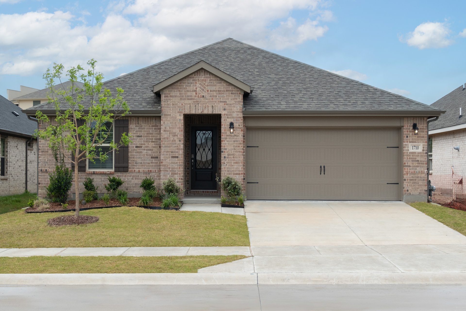 one-story brick exterior with shutters