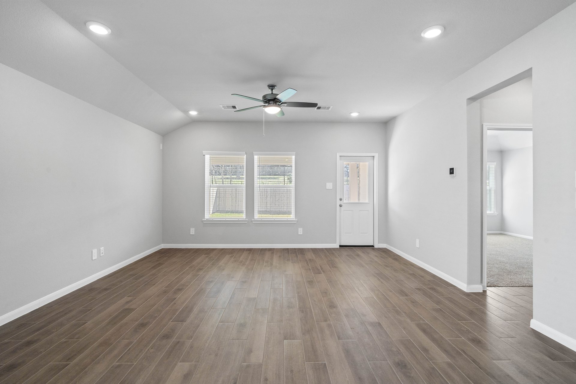 open great room with hardwood flooring