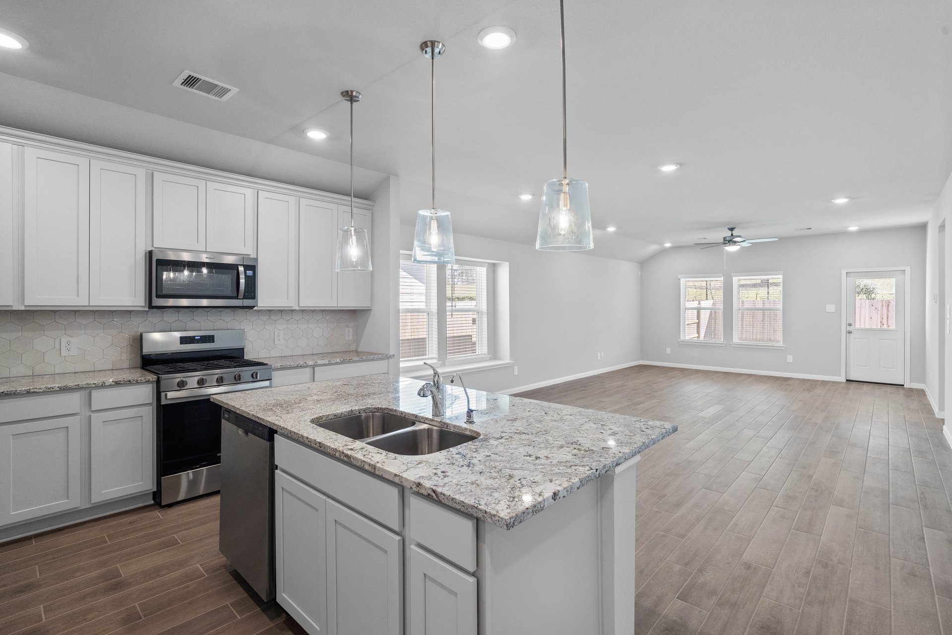 open great room with hardwood flooring