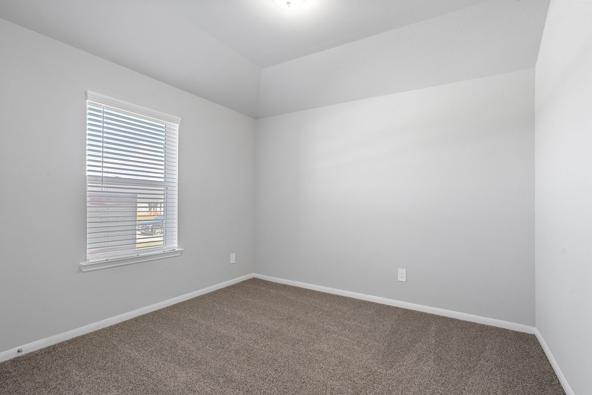 guest bedroom with carpet