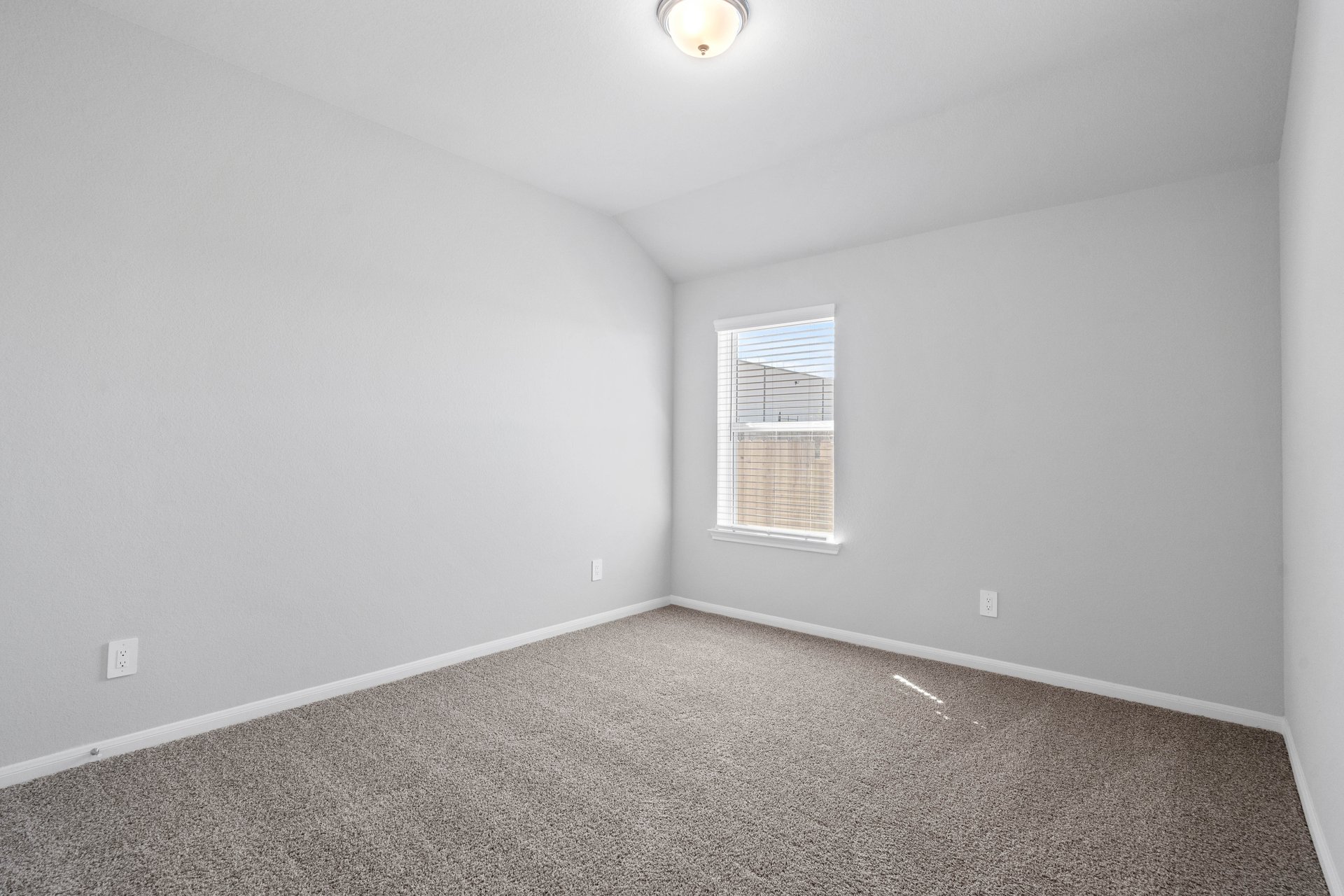 guest bedroom with carpet