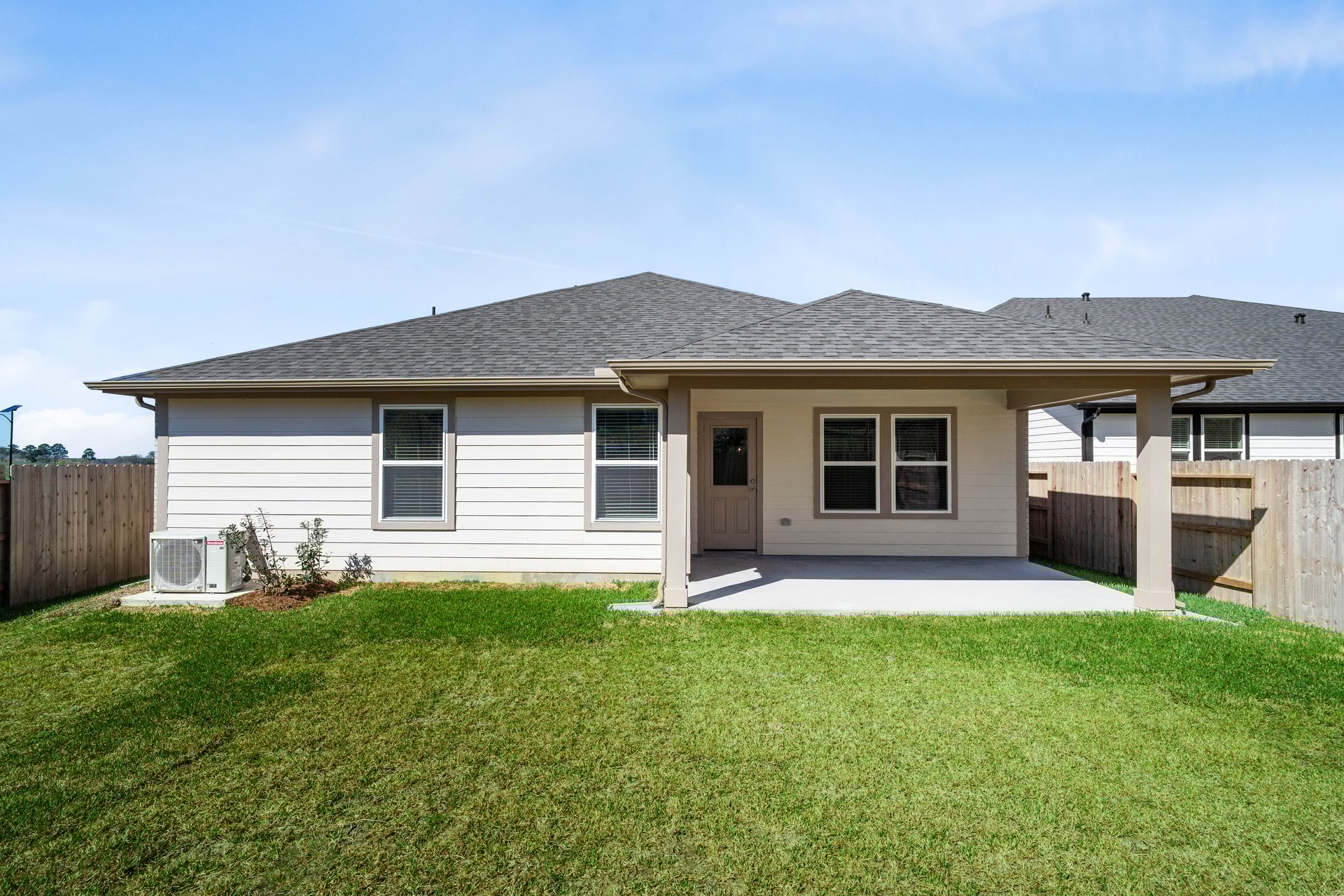 backyard of home with covered patio