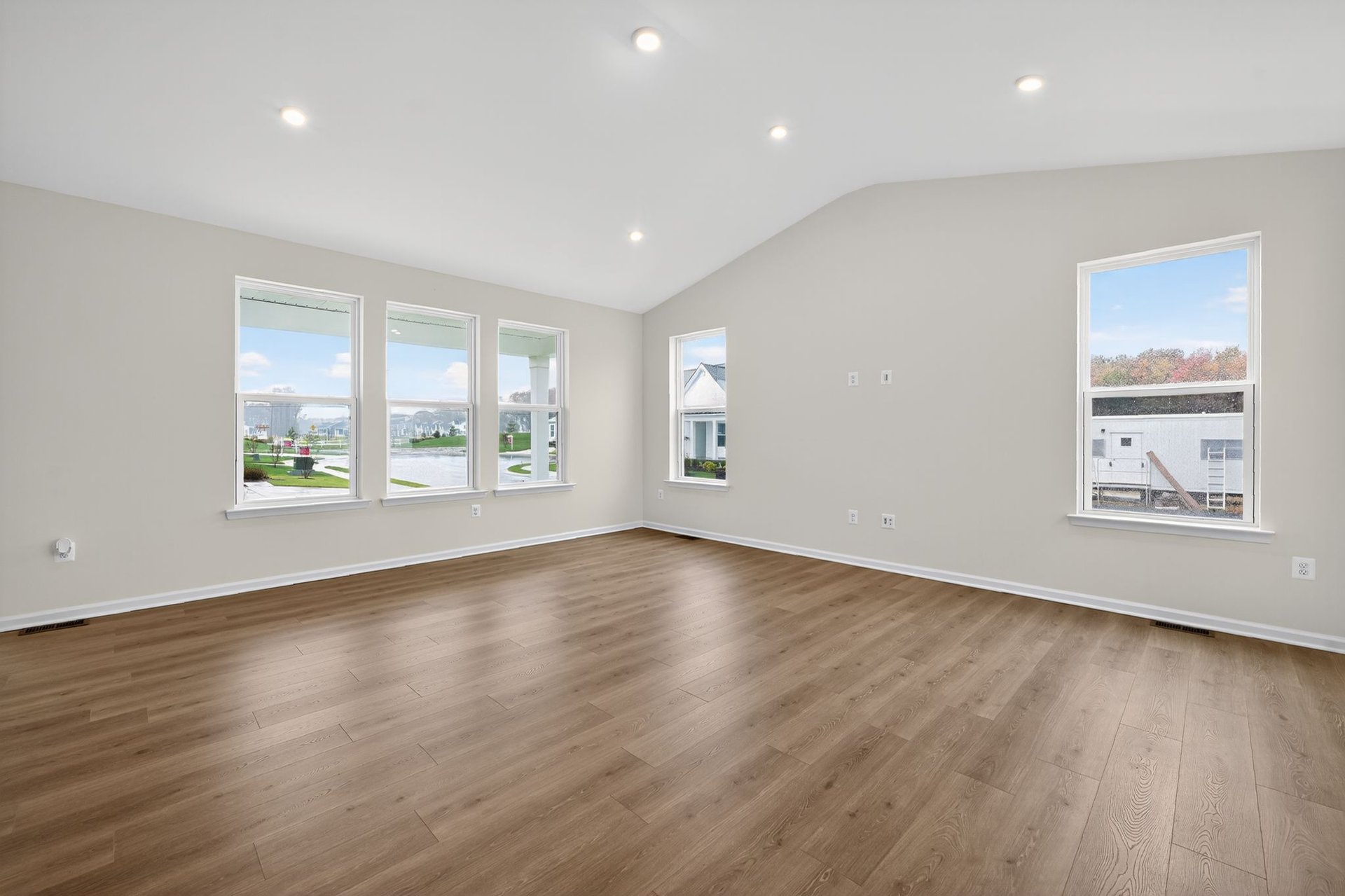 great room with multiple windows and tons of natural light