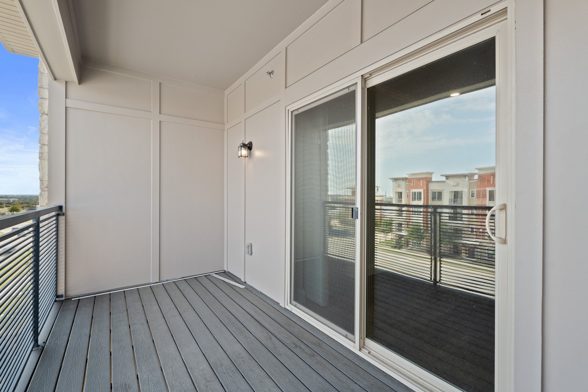 terrace with iron railing and access to great room