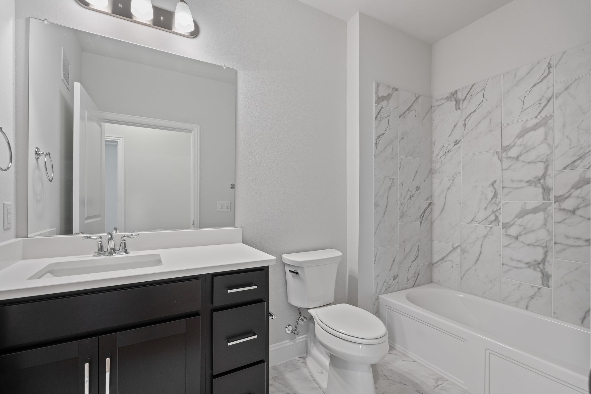 guest bathroom with soaking tub