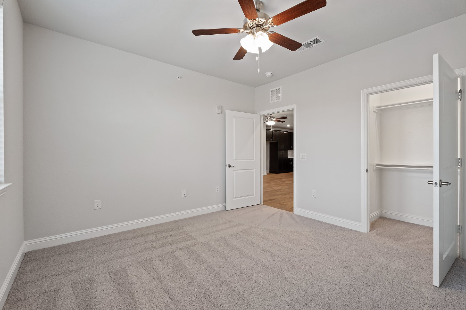 guest bedroom with carpet