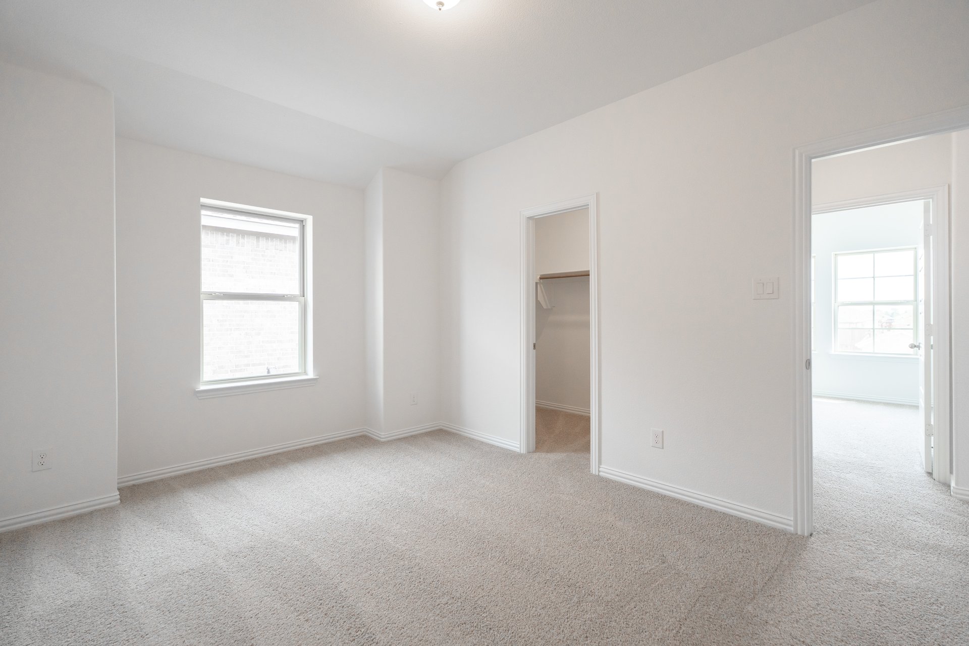 guest bedroom with carpet