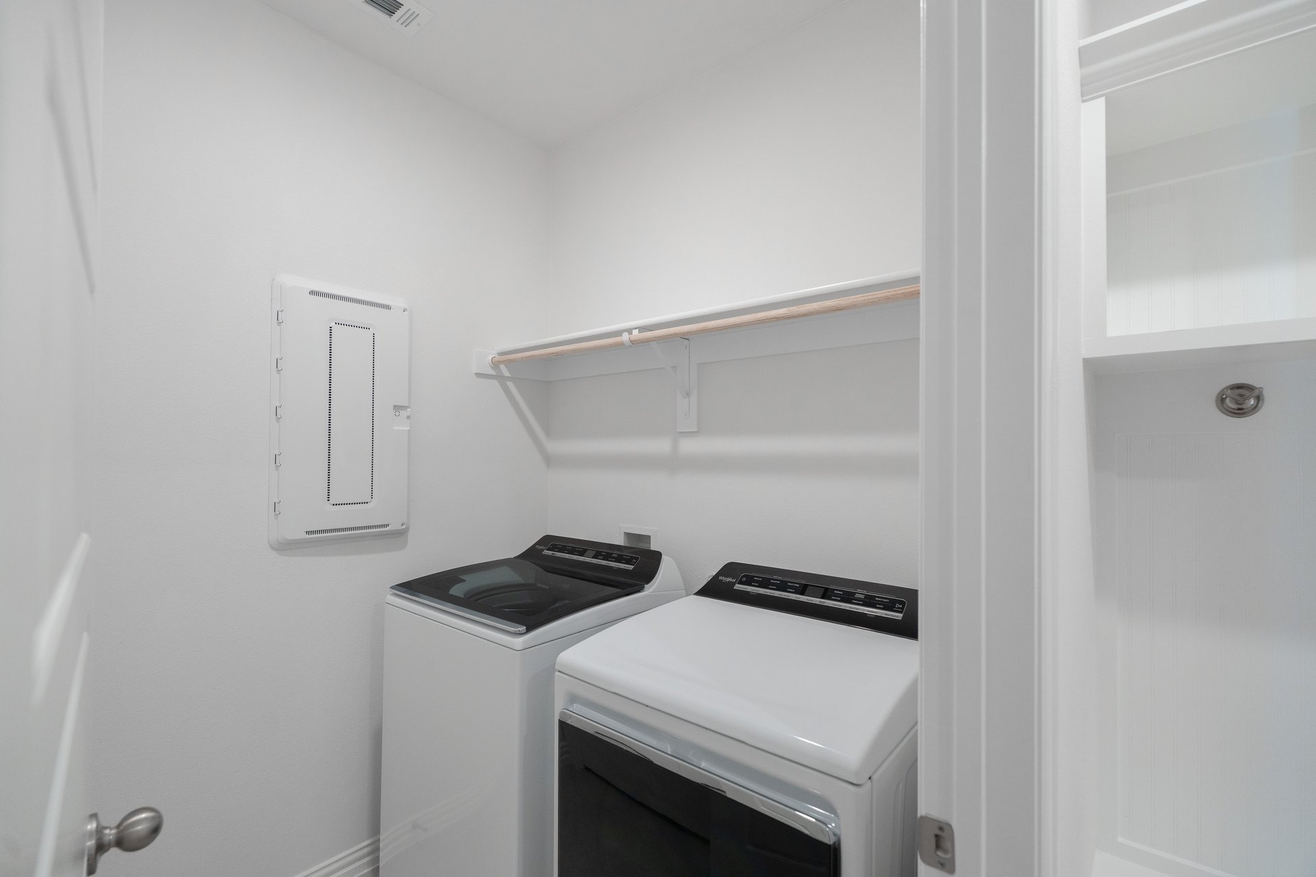 laundry room with tile floors, washer, and dryer