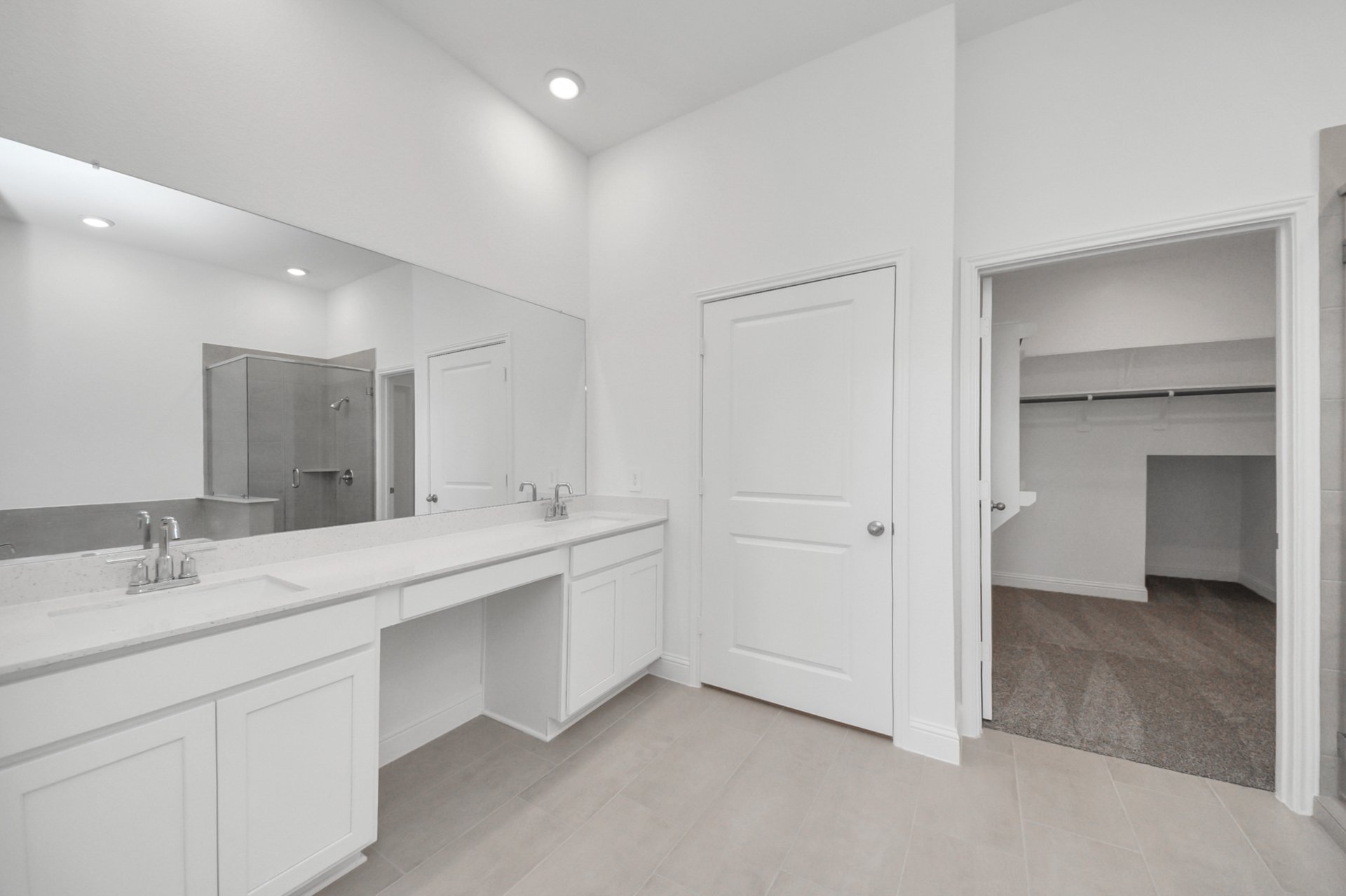 primary bathroom with shower and tub