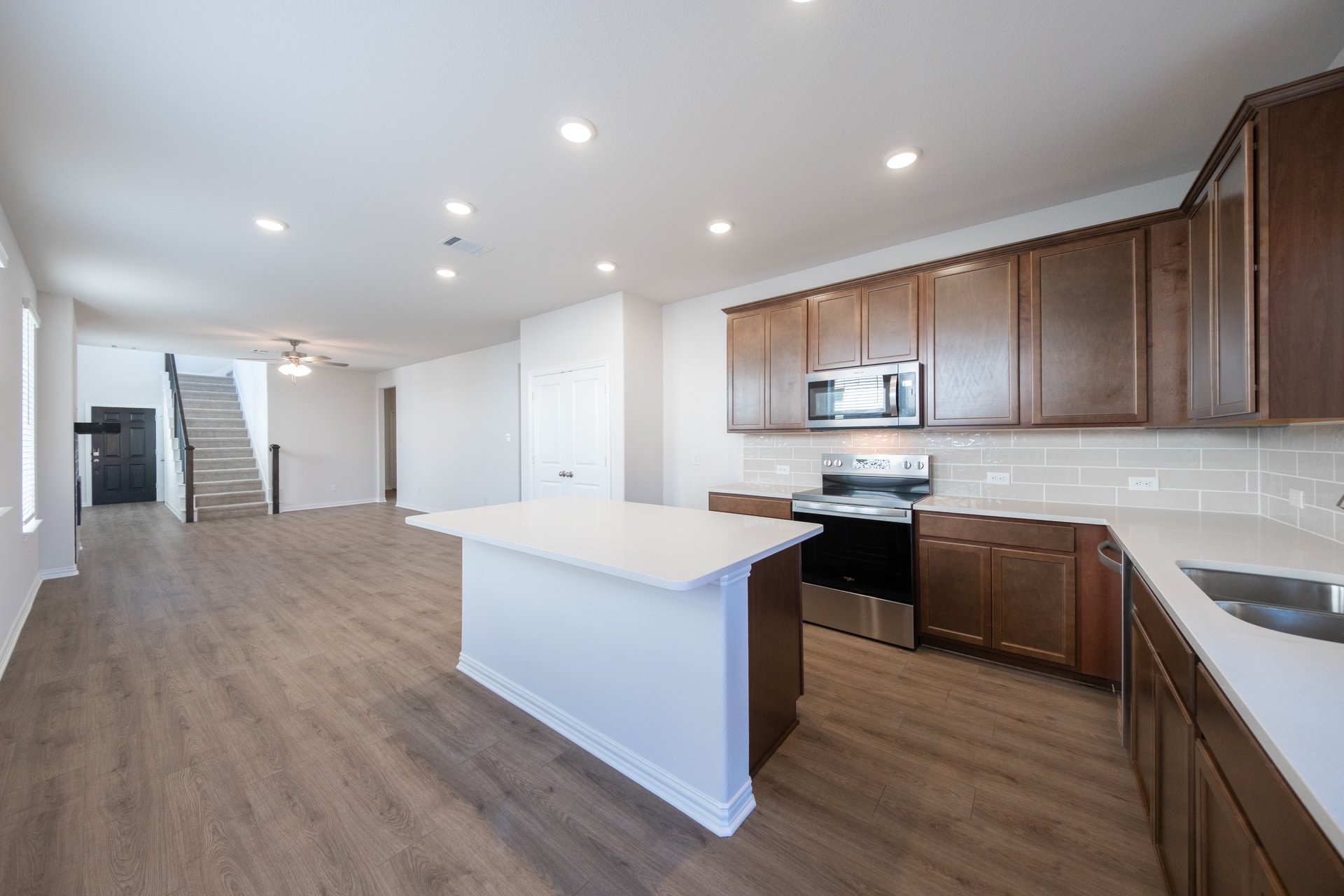 kitchen with large island and white countertops 
