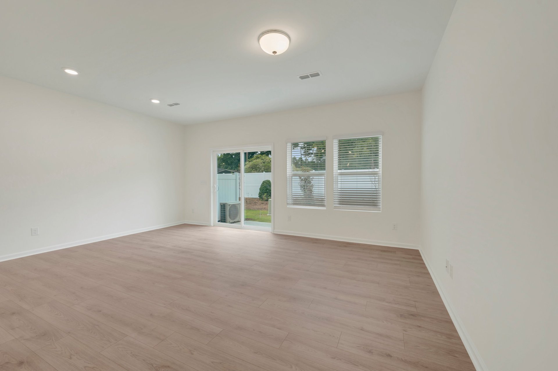 great room with access to the patio