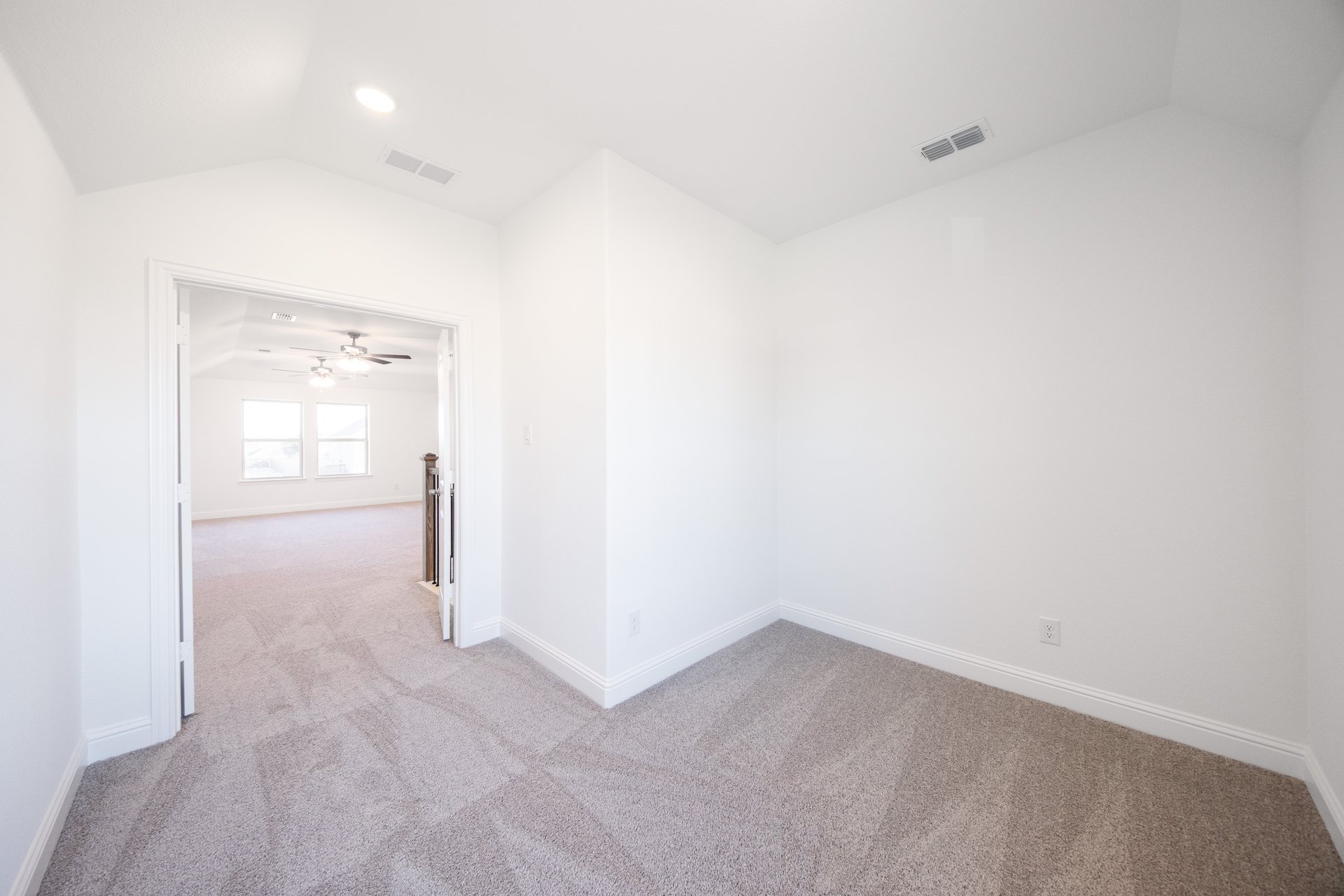 home office with carpet and french doors