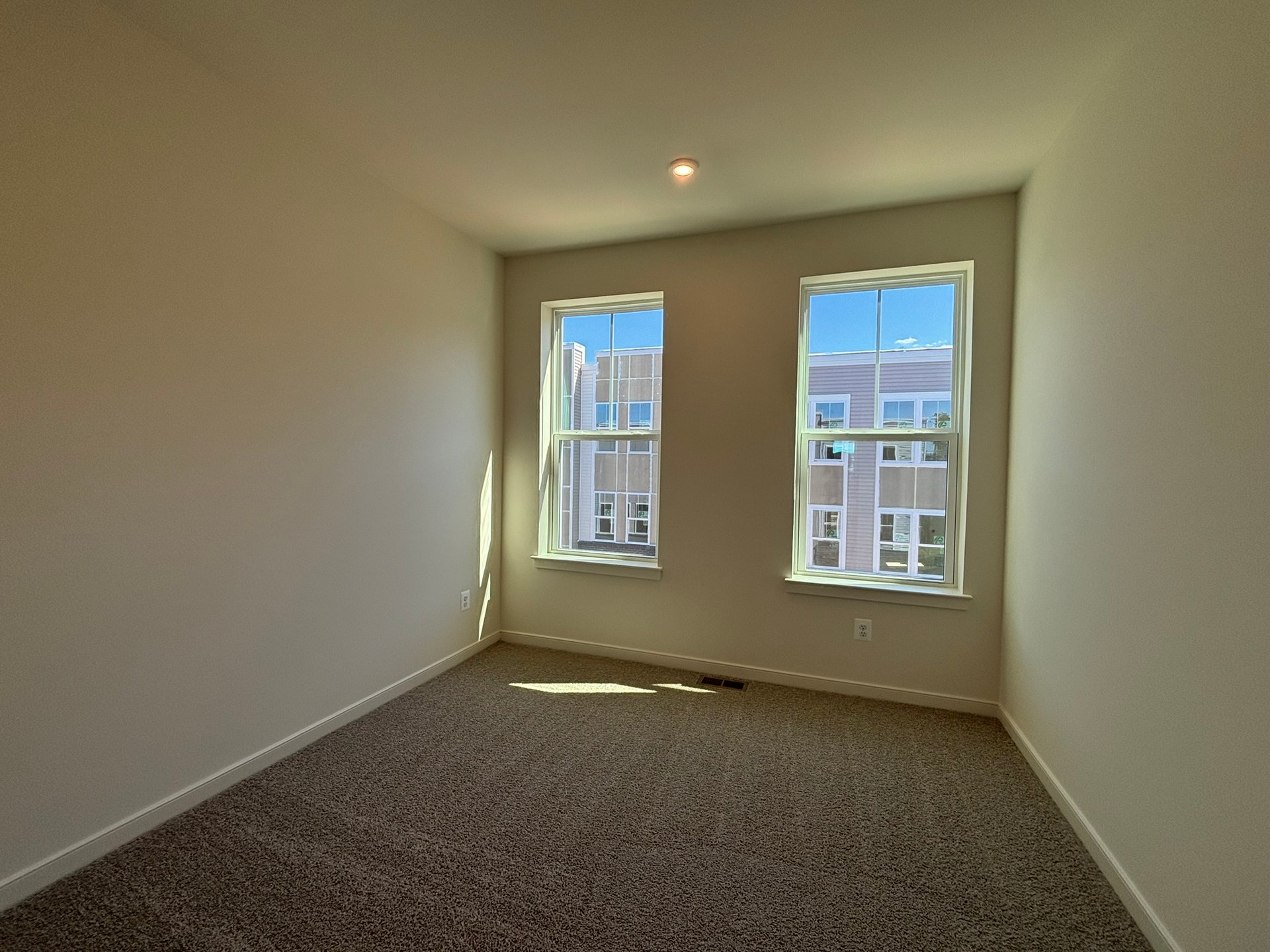 secondary bedroom with carpet