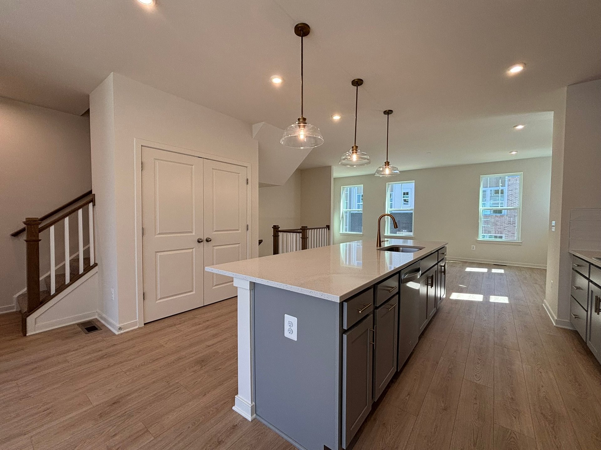 kitchen with pendant lighting and gray cabinets