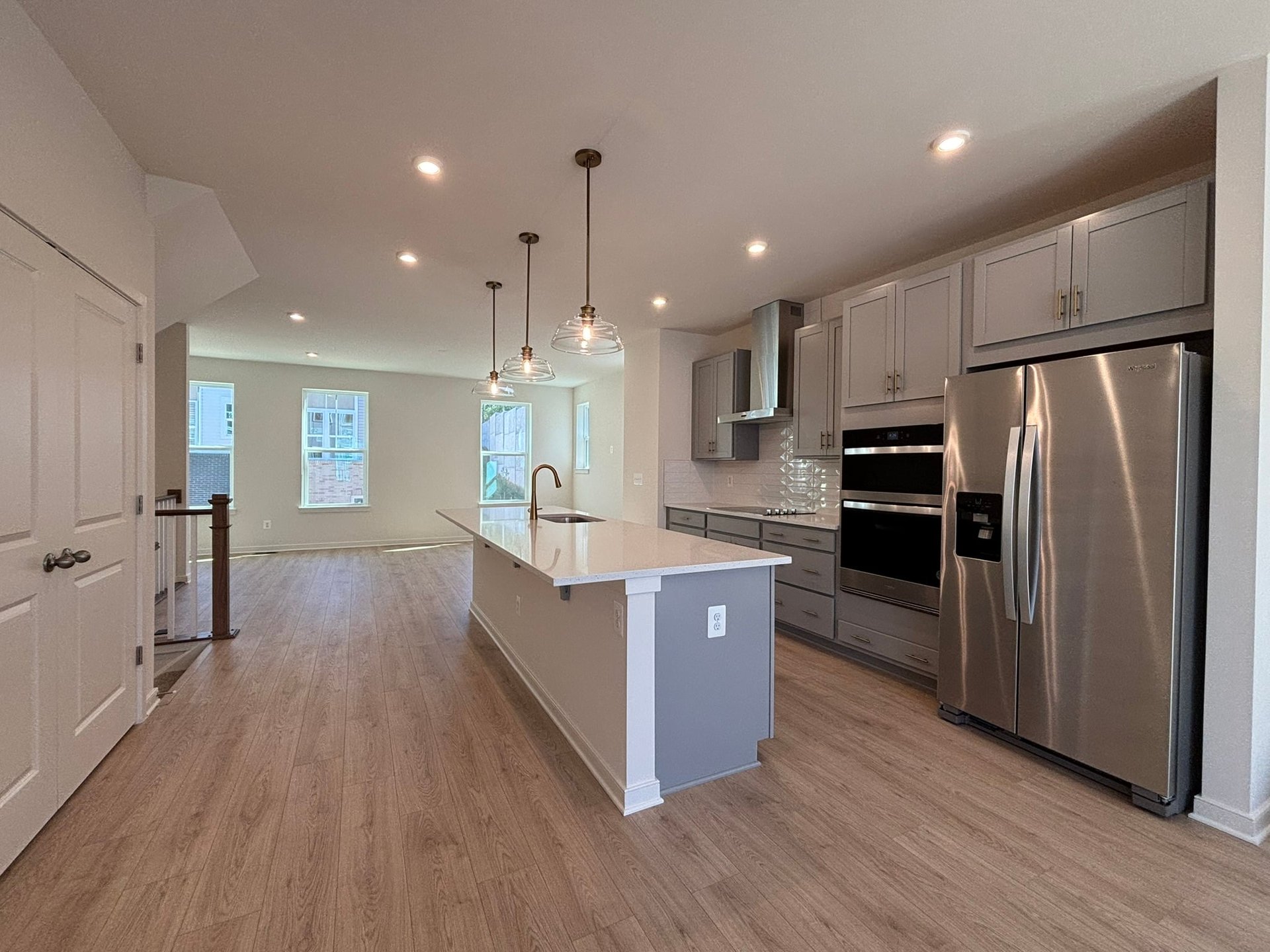 kitchen with a pantry and an island