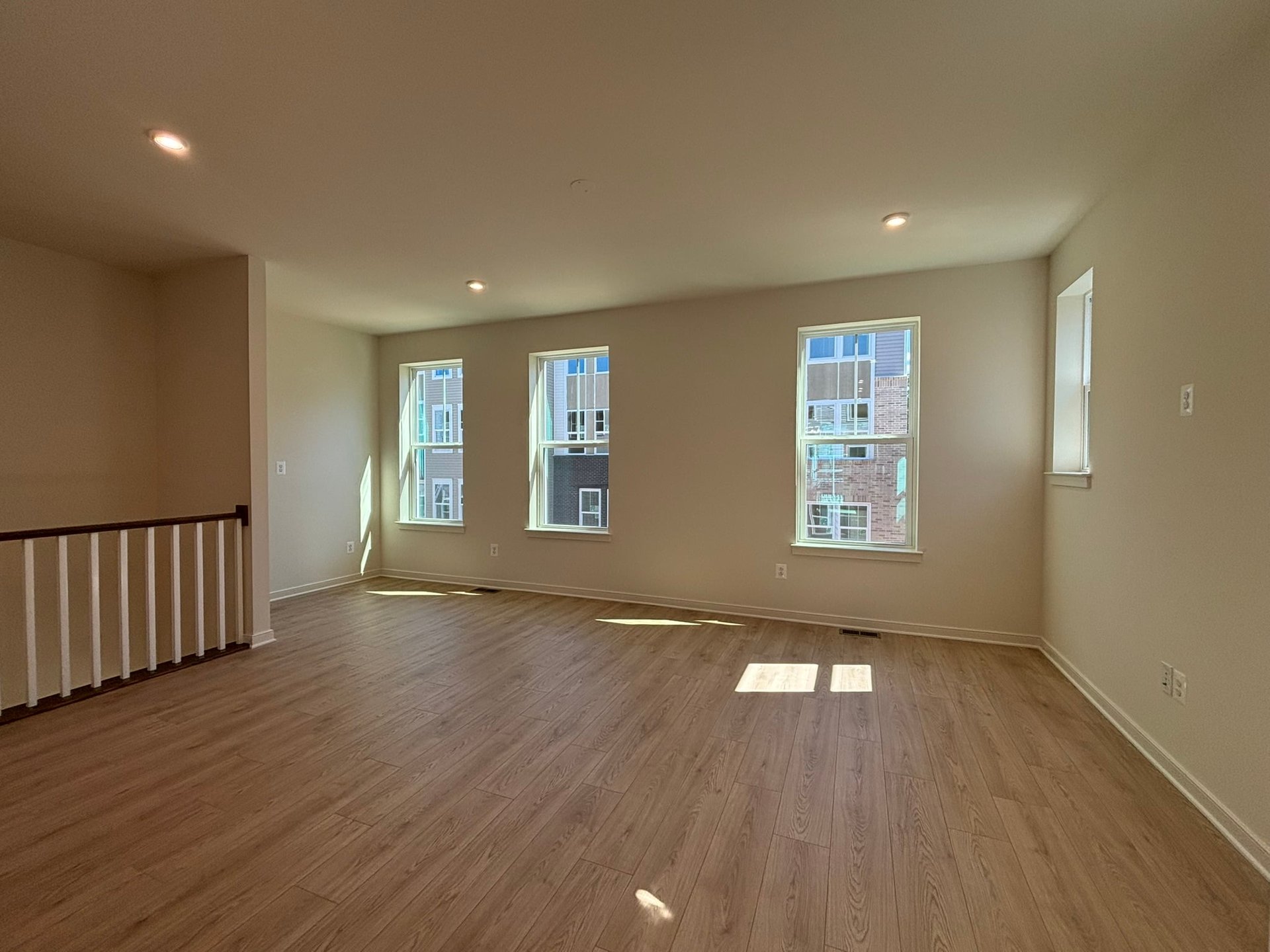 living room and office with four windows