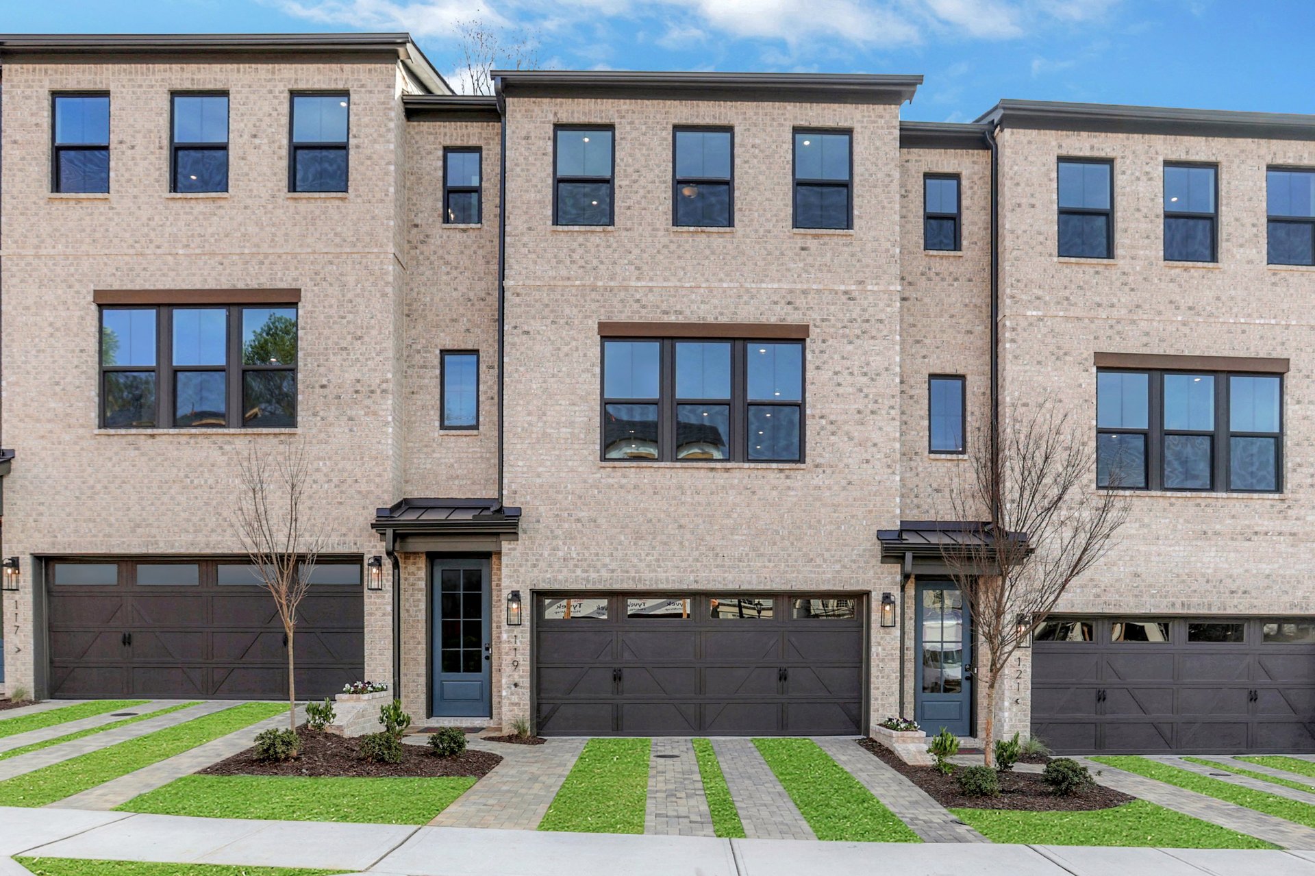 front of townhome with brick 