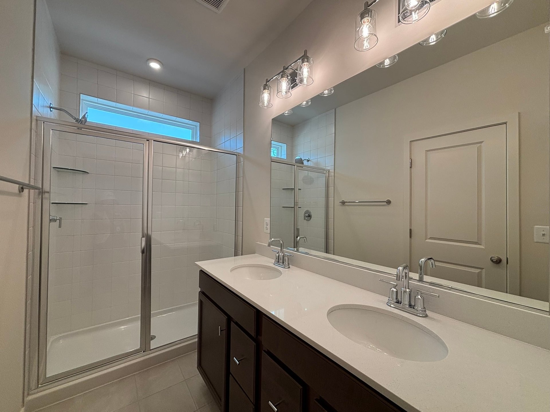 primary bathroom with an oversized shower